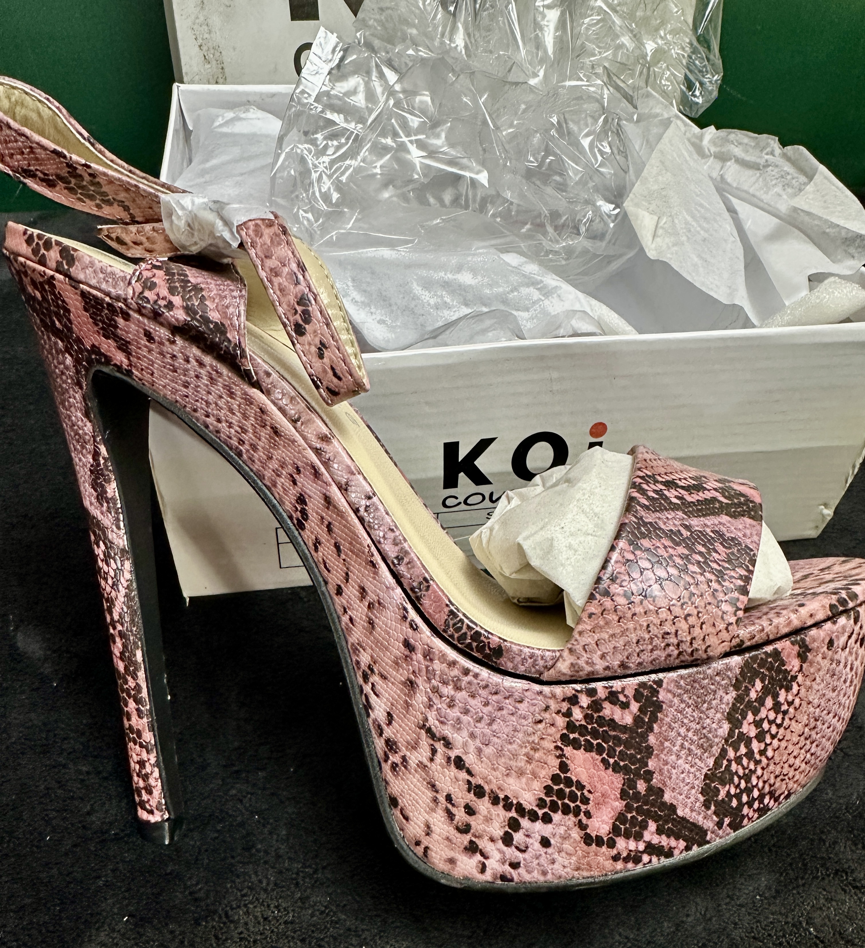 A Pair of Koi Couture Pink Snakeskin Pattern Platform Sandals