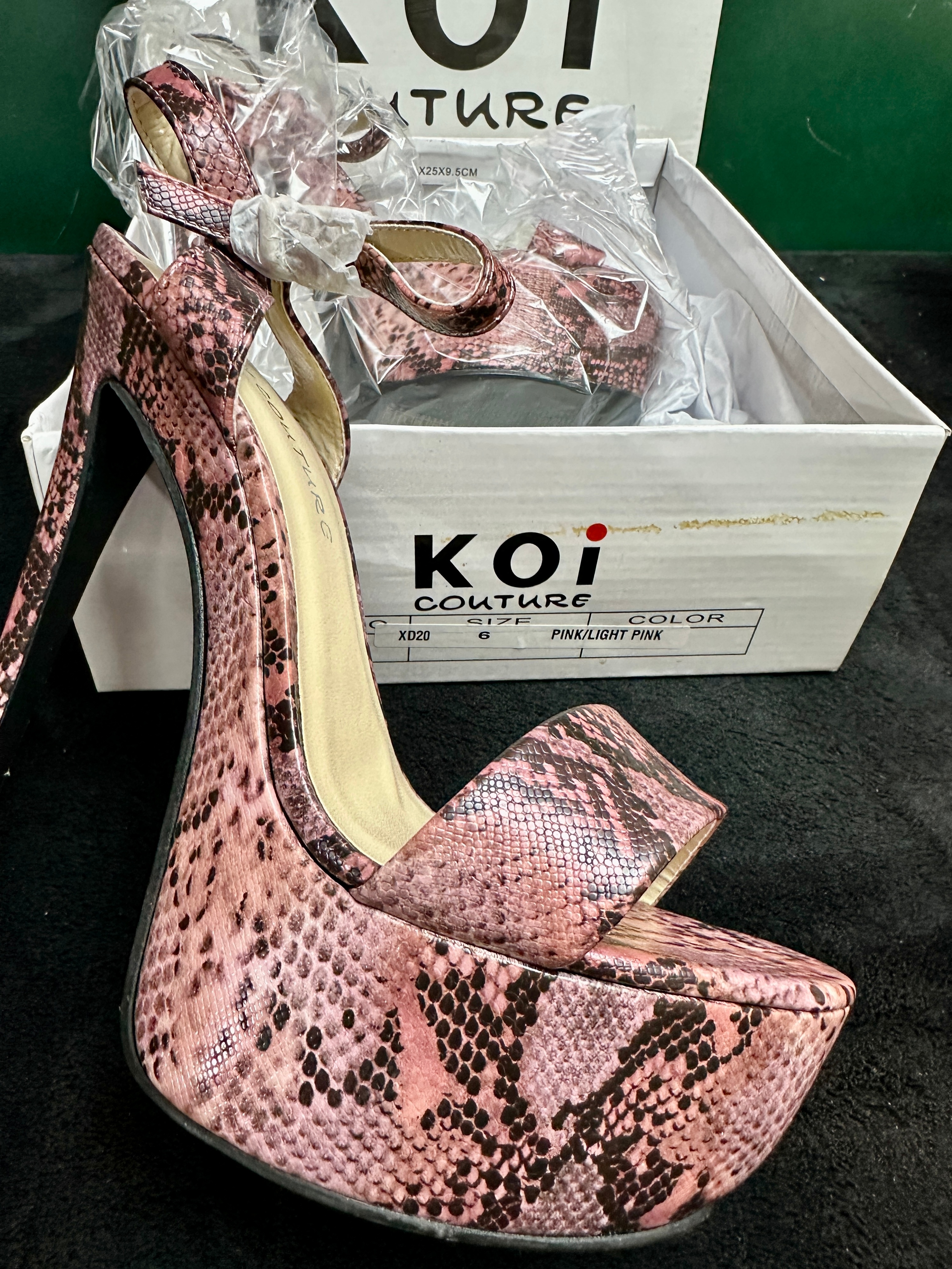 A Pair of Koi Couture Pink Snakeskin Pattern Platform Sandals