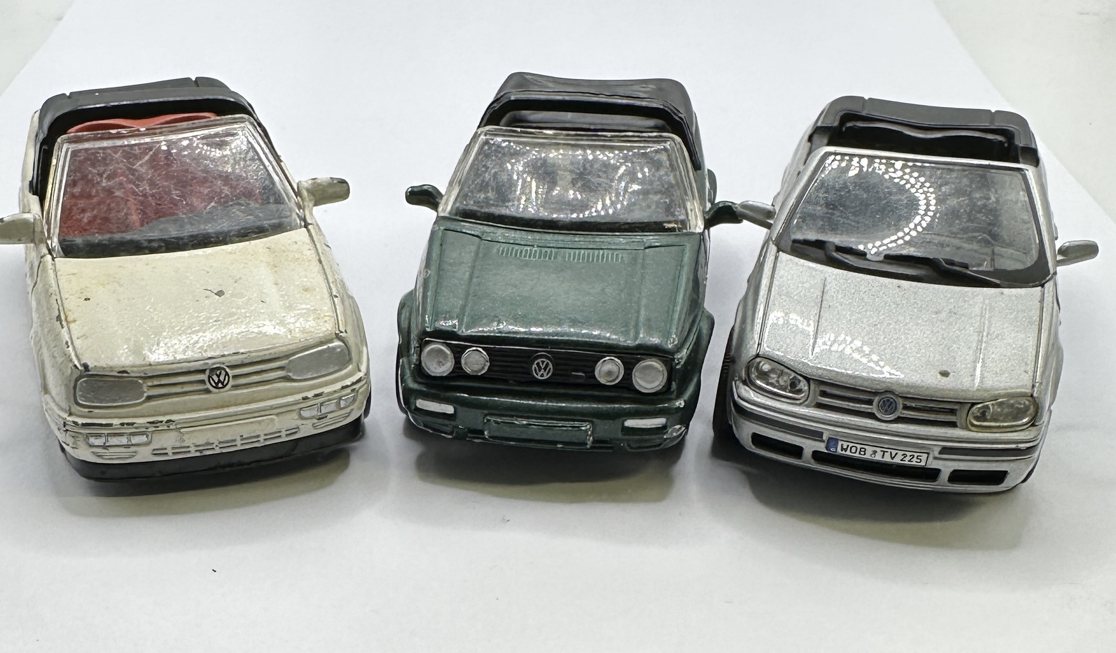 Three 1997 NewRay Volkswagen Golf Cabriolet Toy Models