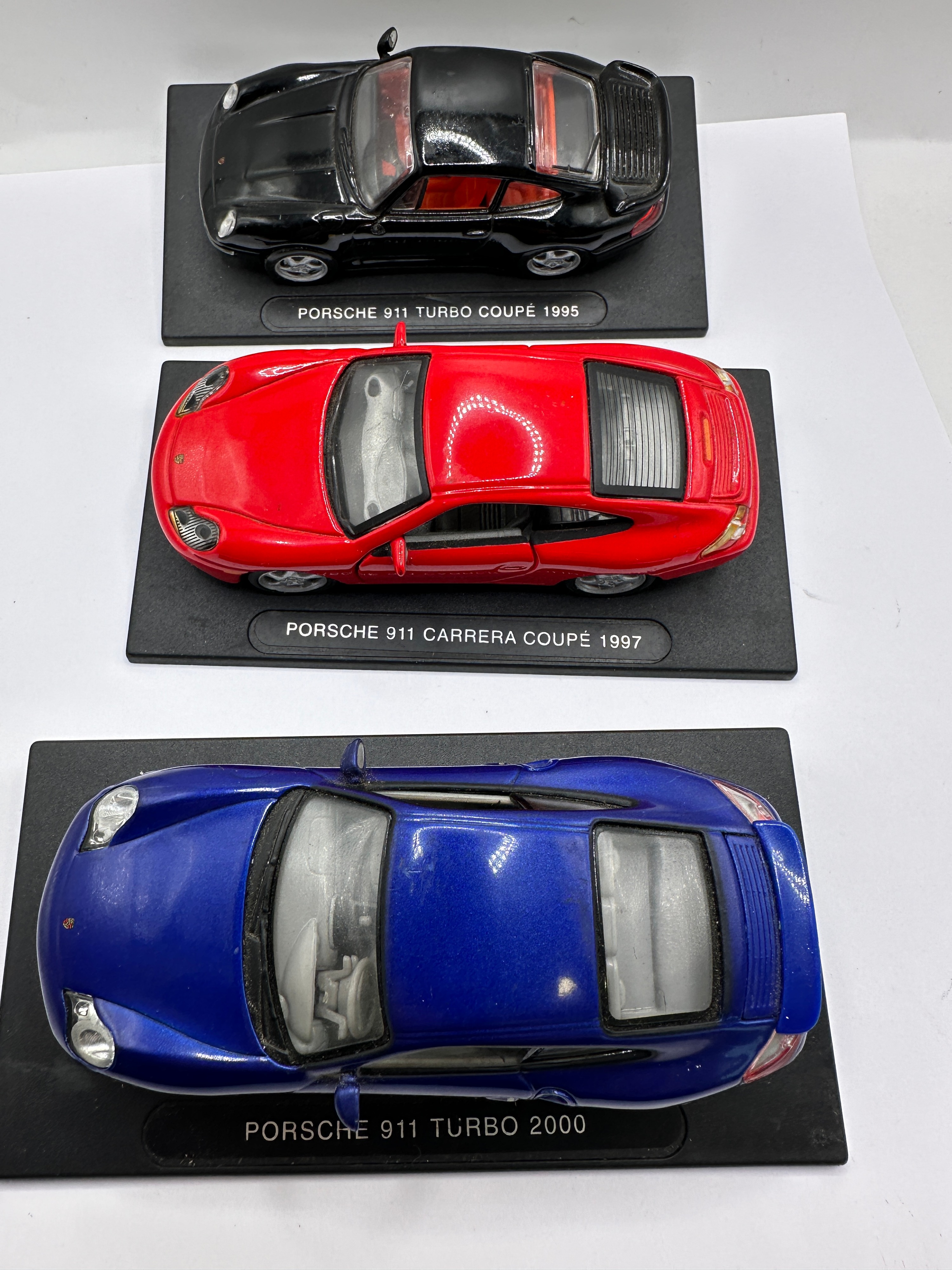 A Set of Porsche 911 and 944 Scale Model Cars