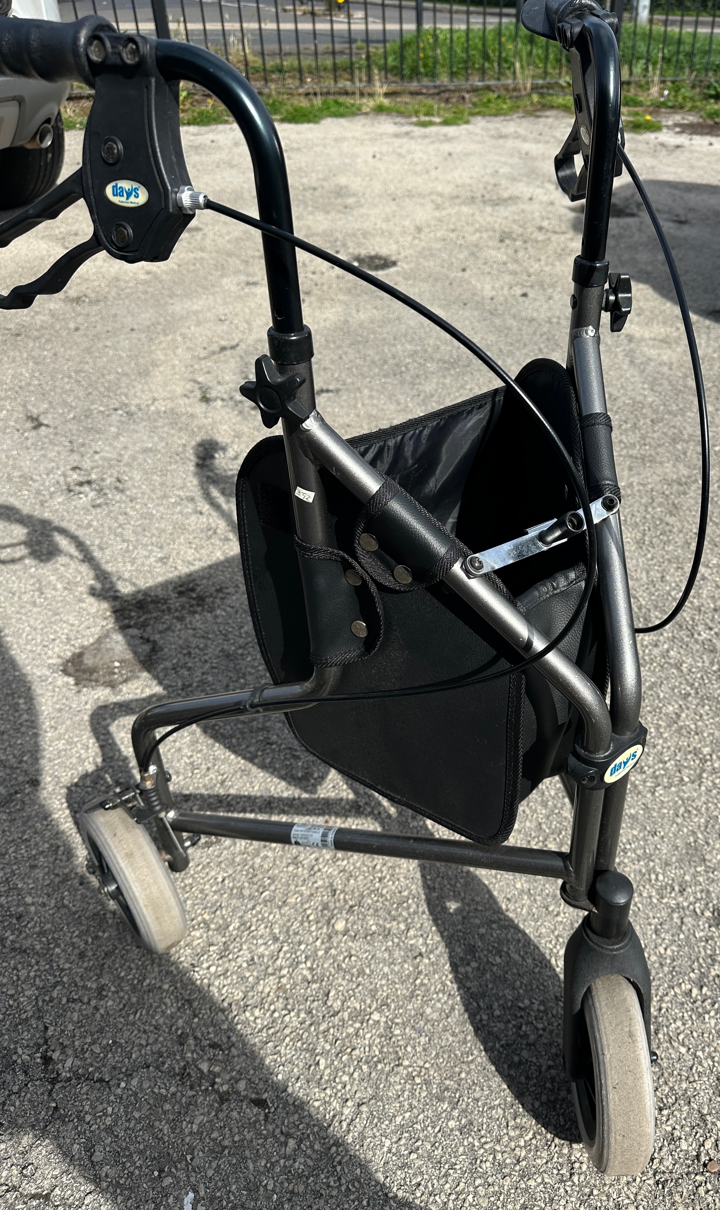 A Days Patterson Medical Tri Wheel Walker Rollator With Storage Bag