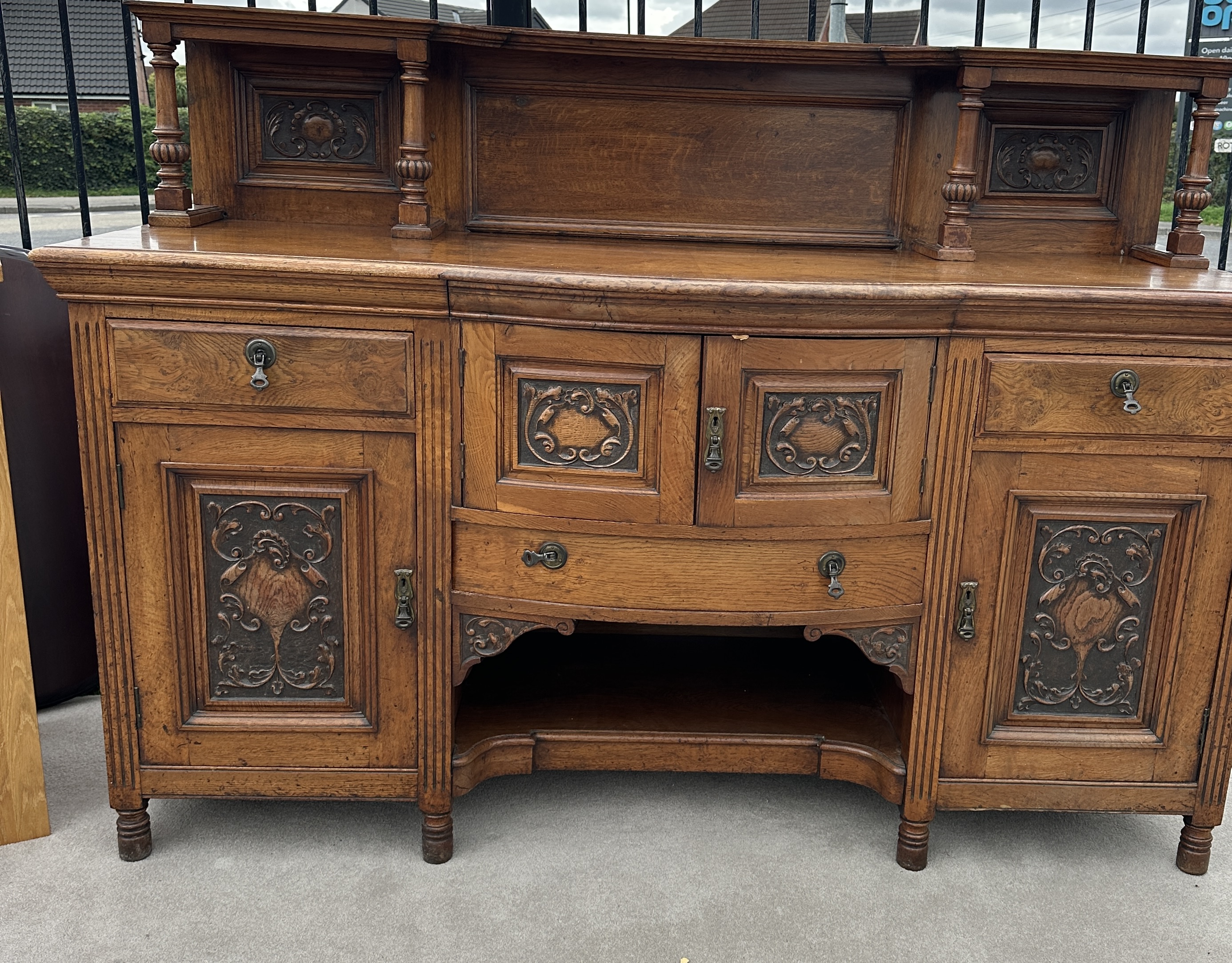A Late Victorian Breakfront Oak Sideboard With Relief Carving