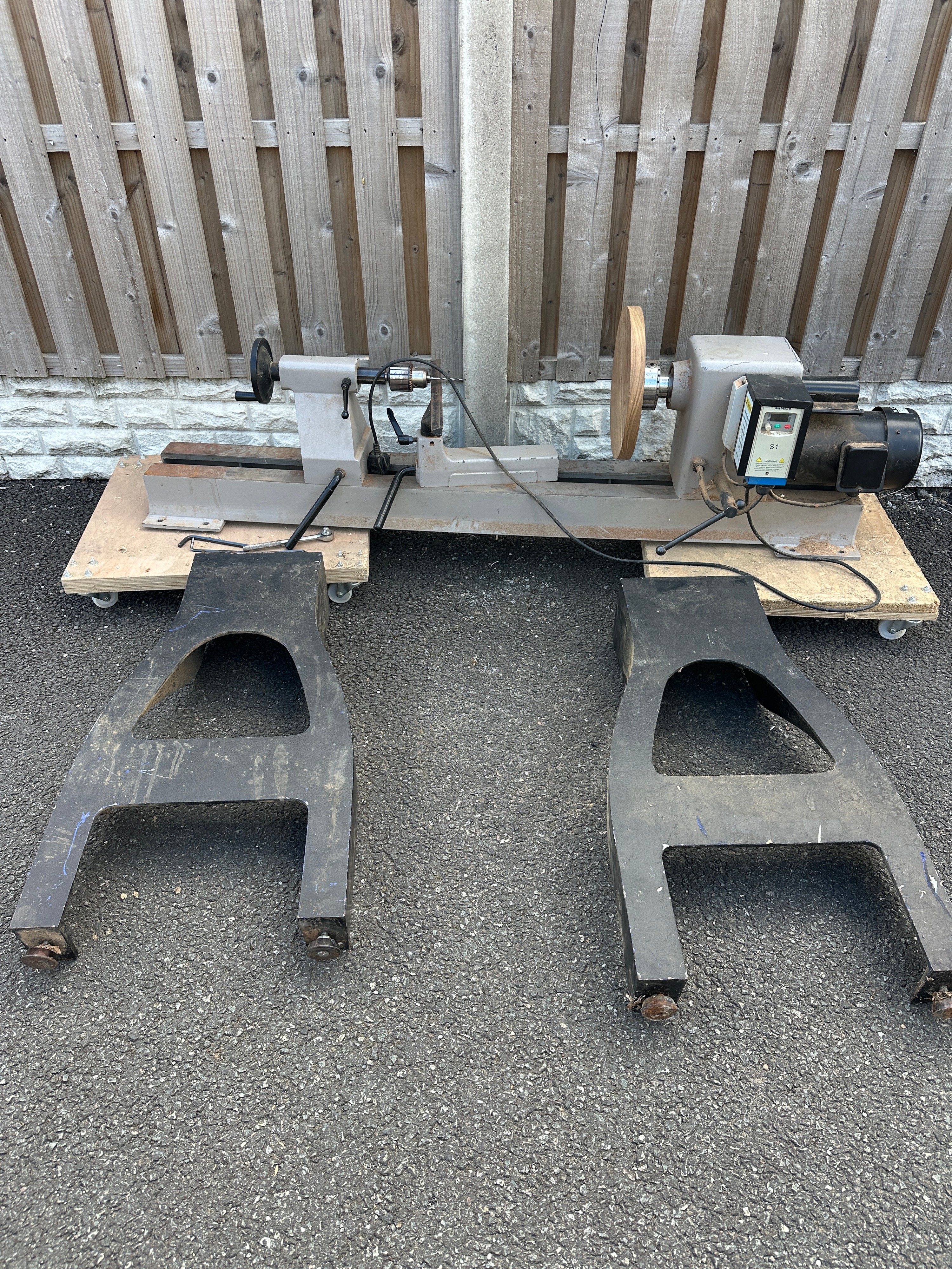 A Woodturning Lathe with Variable Frequency Drive and Cast Metal Stand