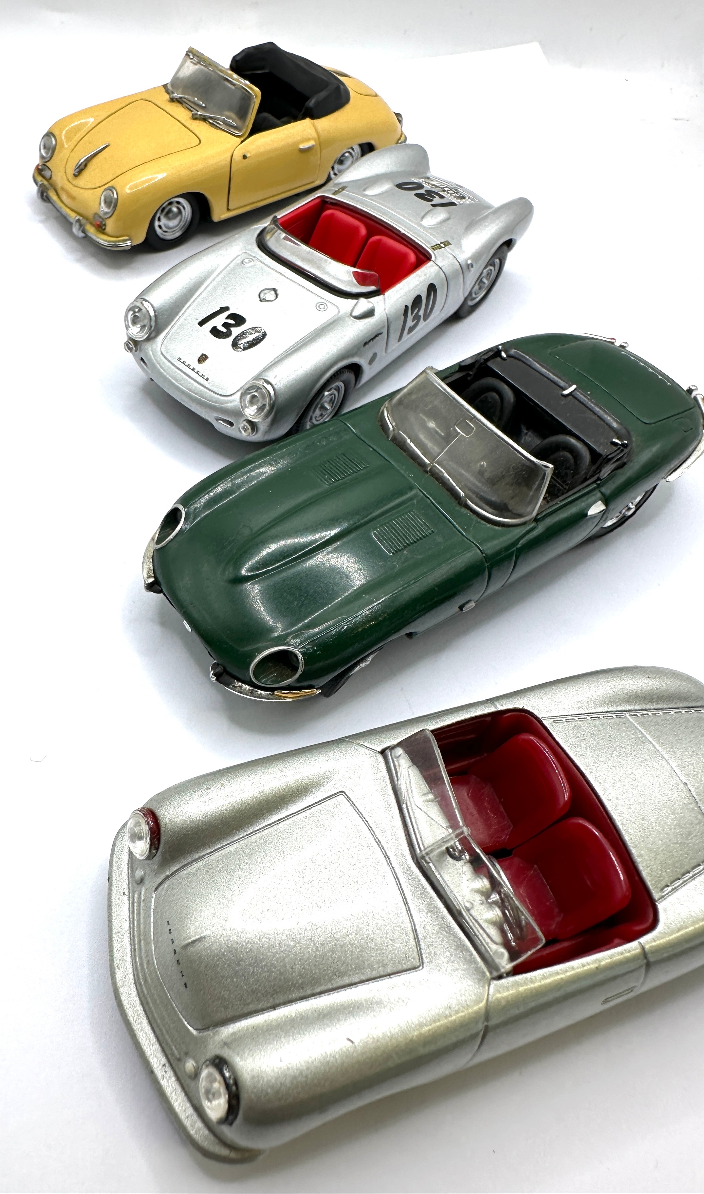 A Collection of Four Mid-20th Century Style European Sports Car Models