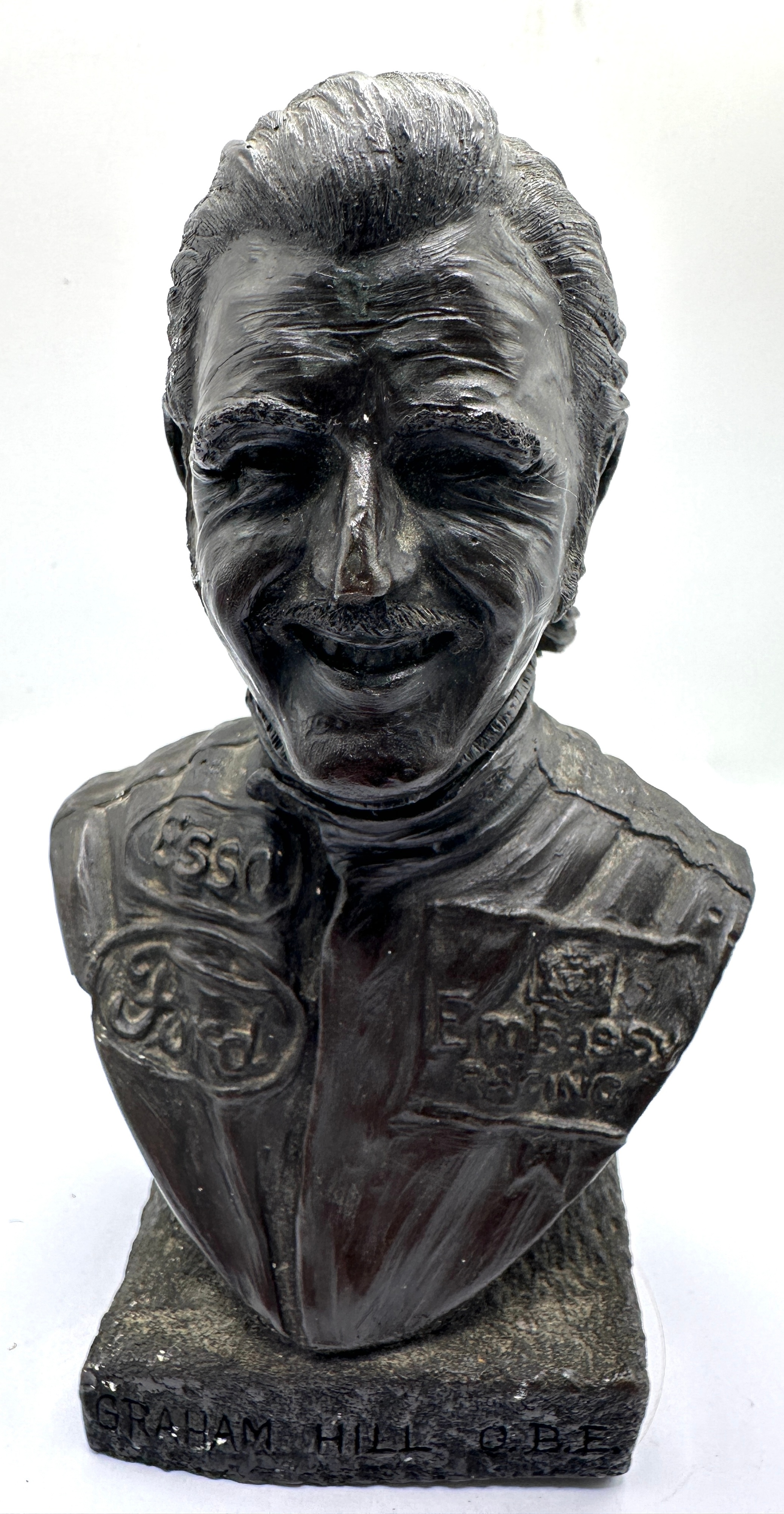 A Portrait Bust Of Graham Hill OBE
