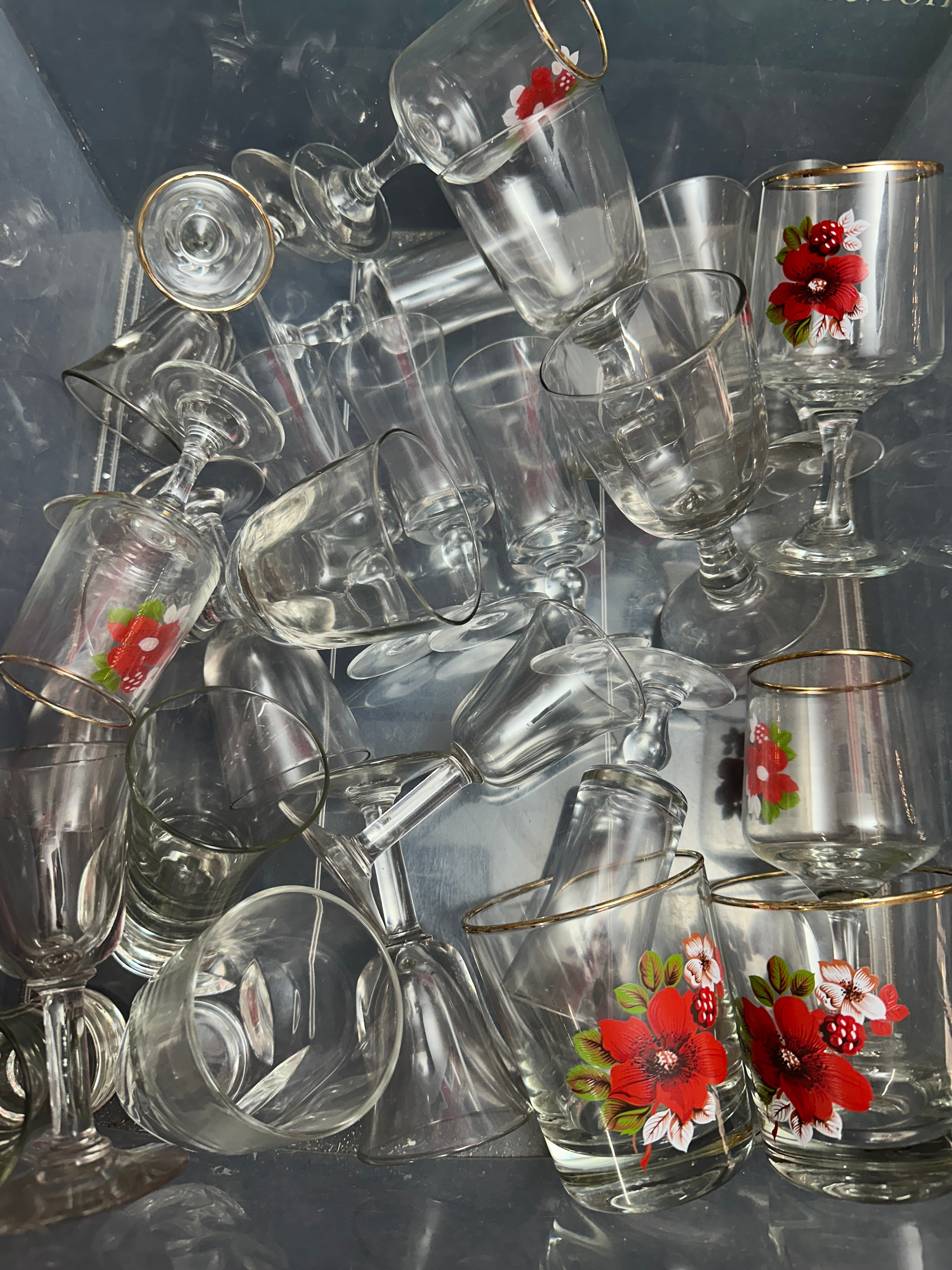 An Assortment of Clear Glassware, Including Transfer-Printed Floral Wares