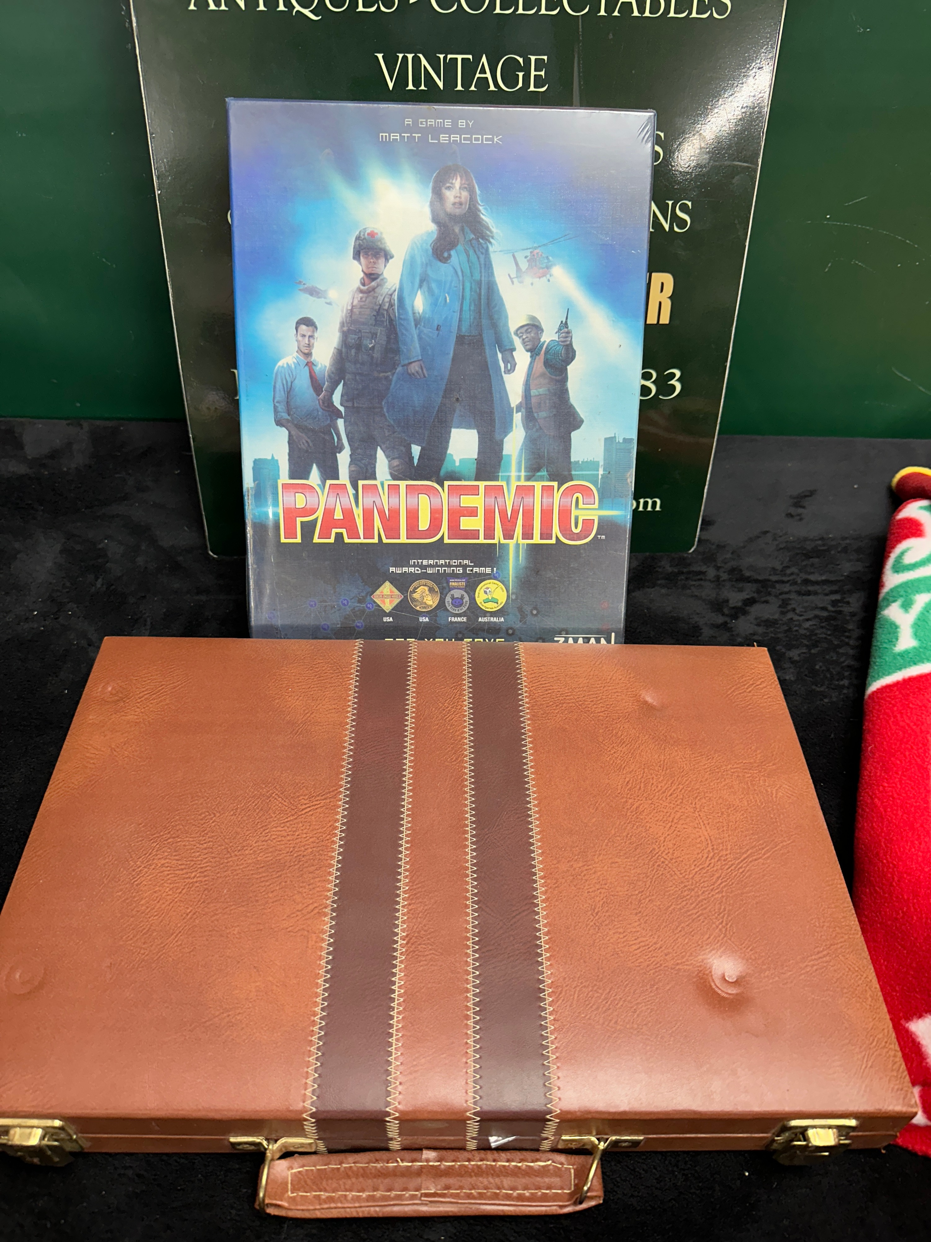 A Z-Man Games Pandemic Board Game and a Backgammon Set