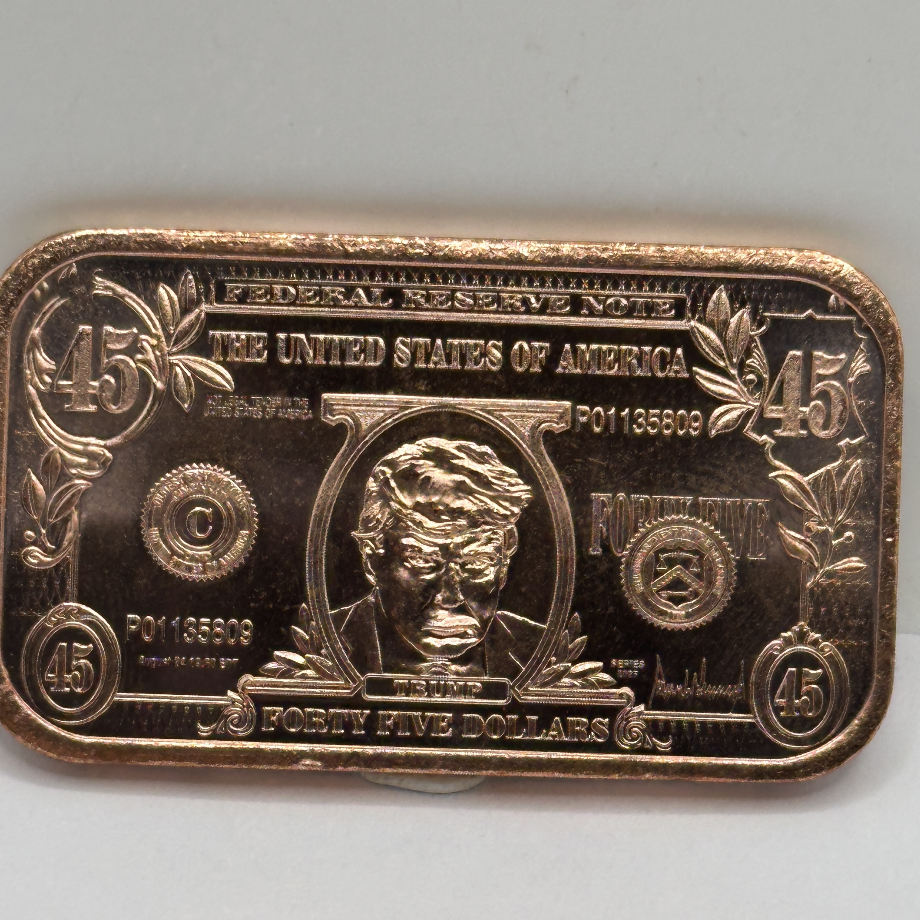 A United States Series Donald Trump 45 Banknote Copper One Ounce Bar