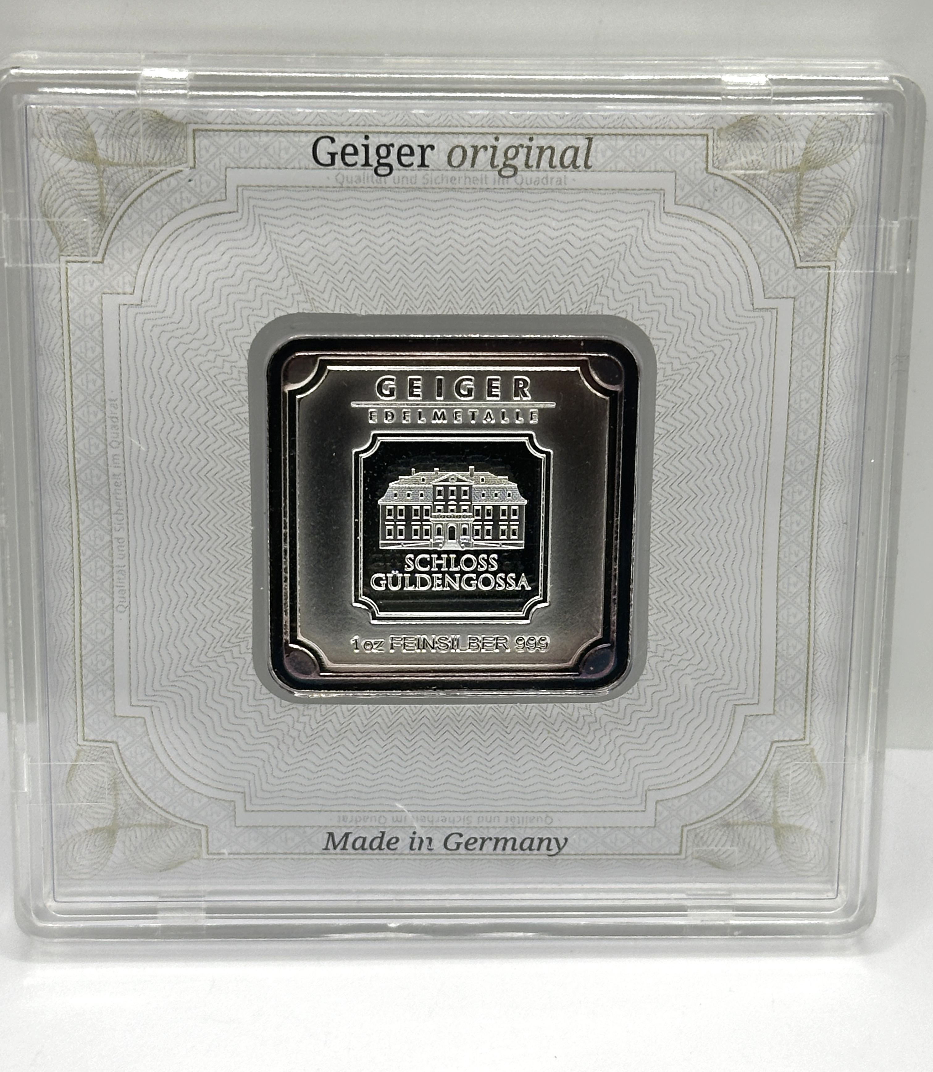 A Geiger Edelmetalle 1 oz Silver Square Bar in Assay Card