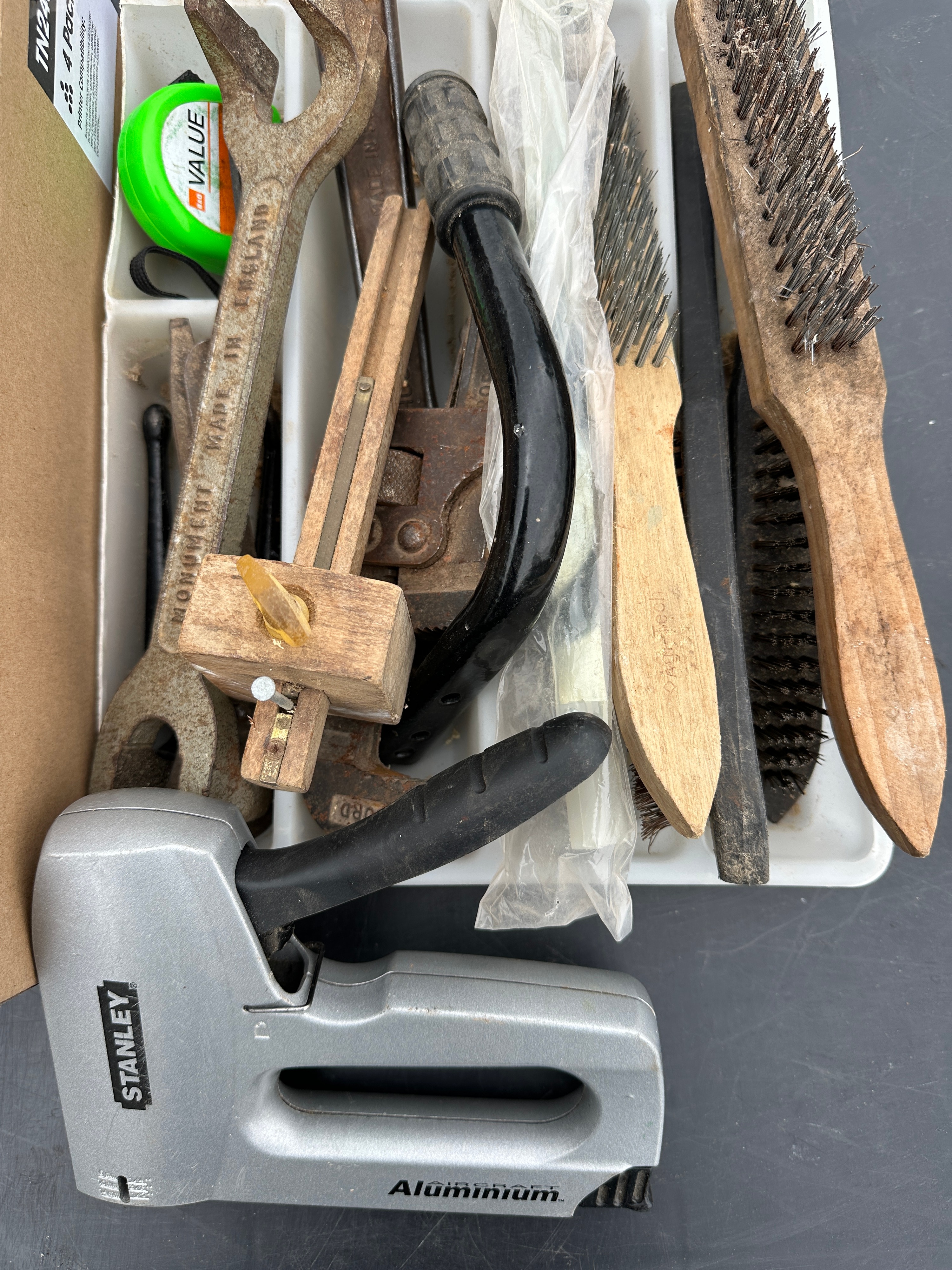 A Group of Hand Tools and Abrasives including a Stanley Stapler