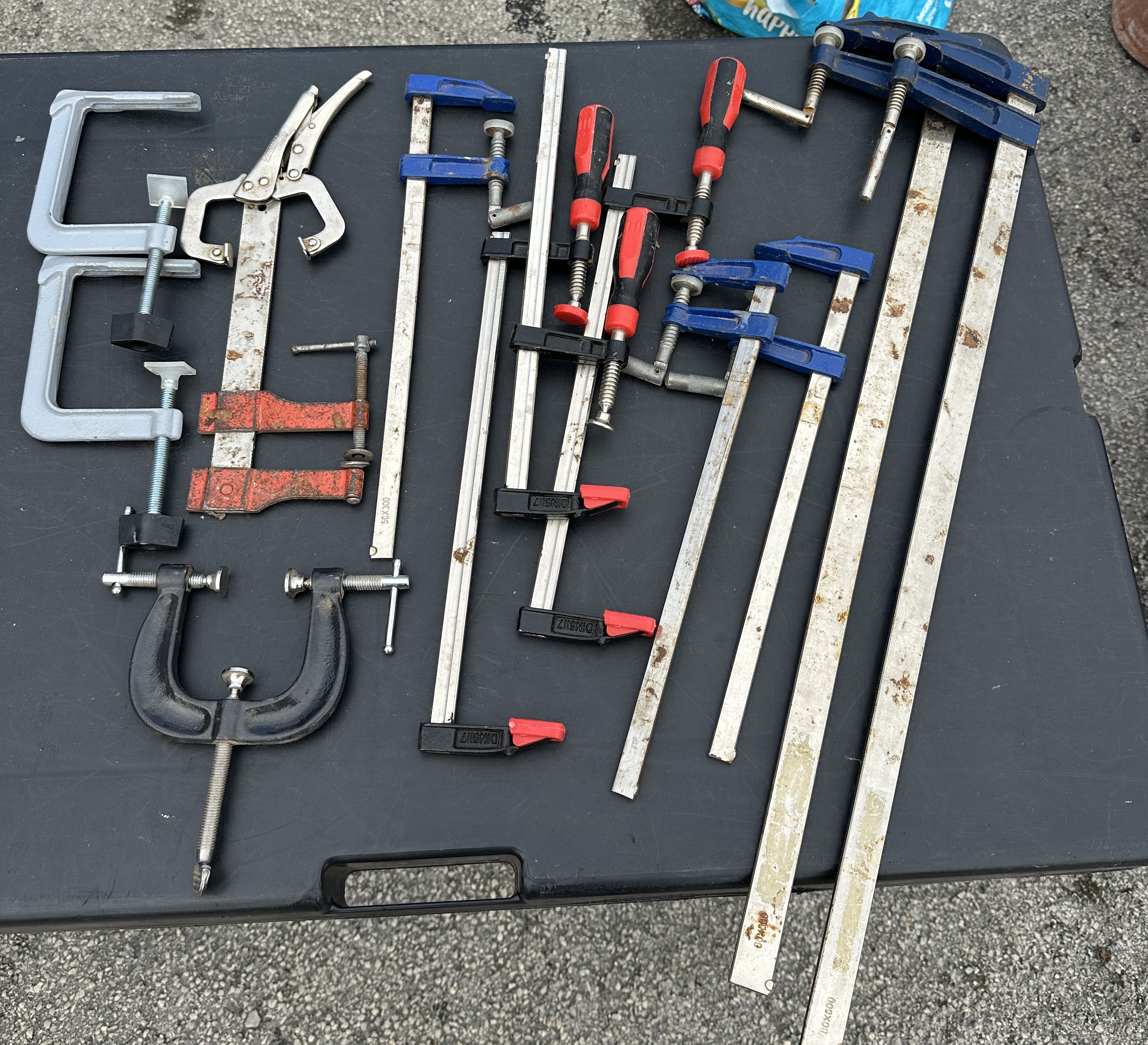 An Assortment of Workshop Clamps Including F-Clamps and G-Clamps