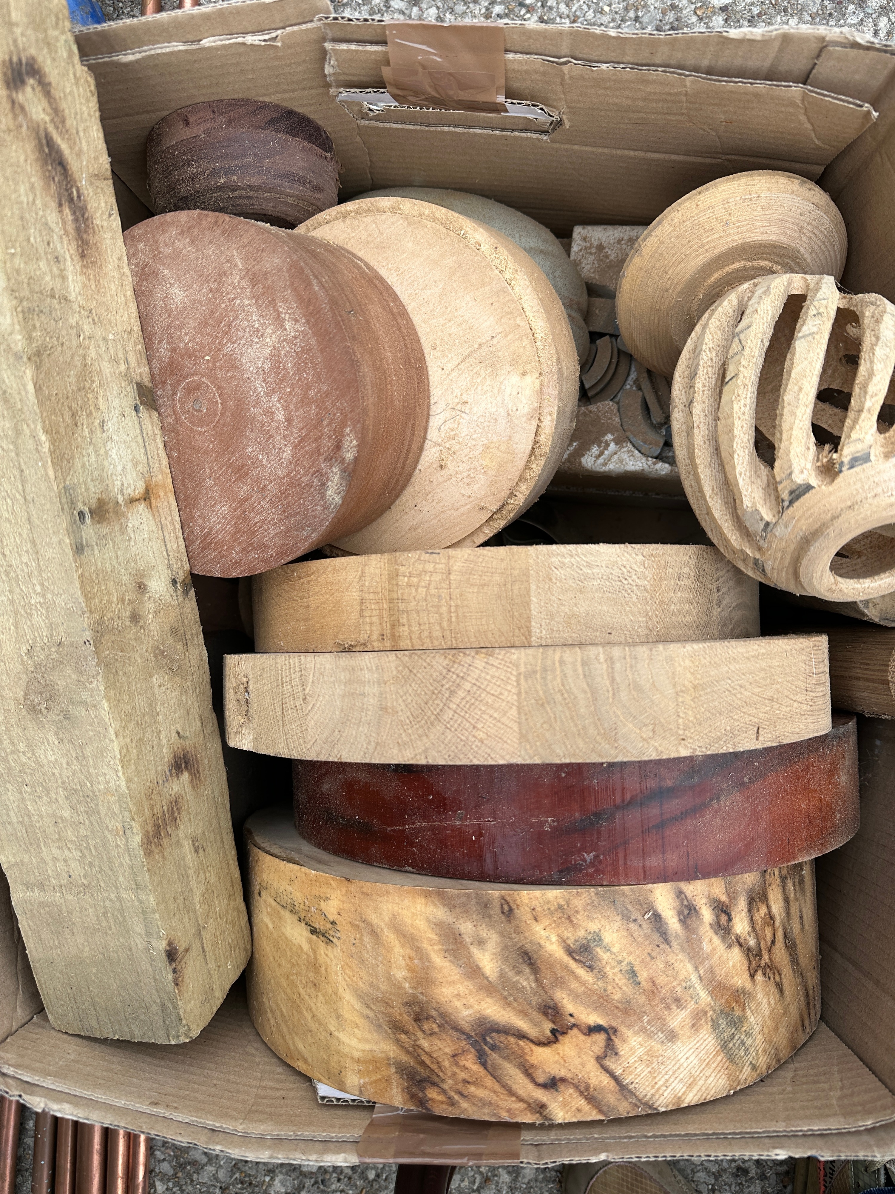 A Collection of Hardwood Woodturning Blanks and Partially Completed Projects