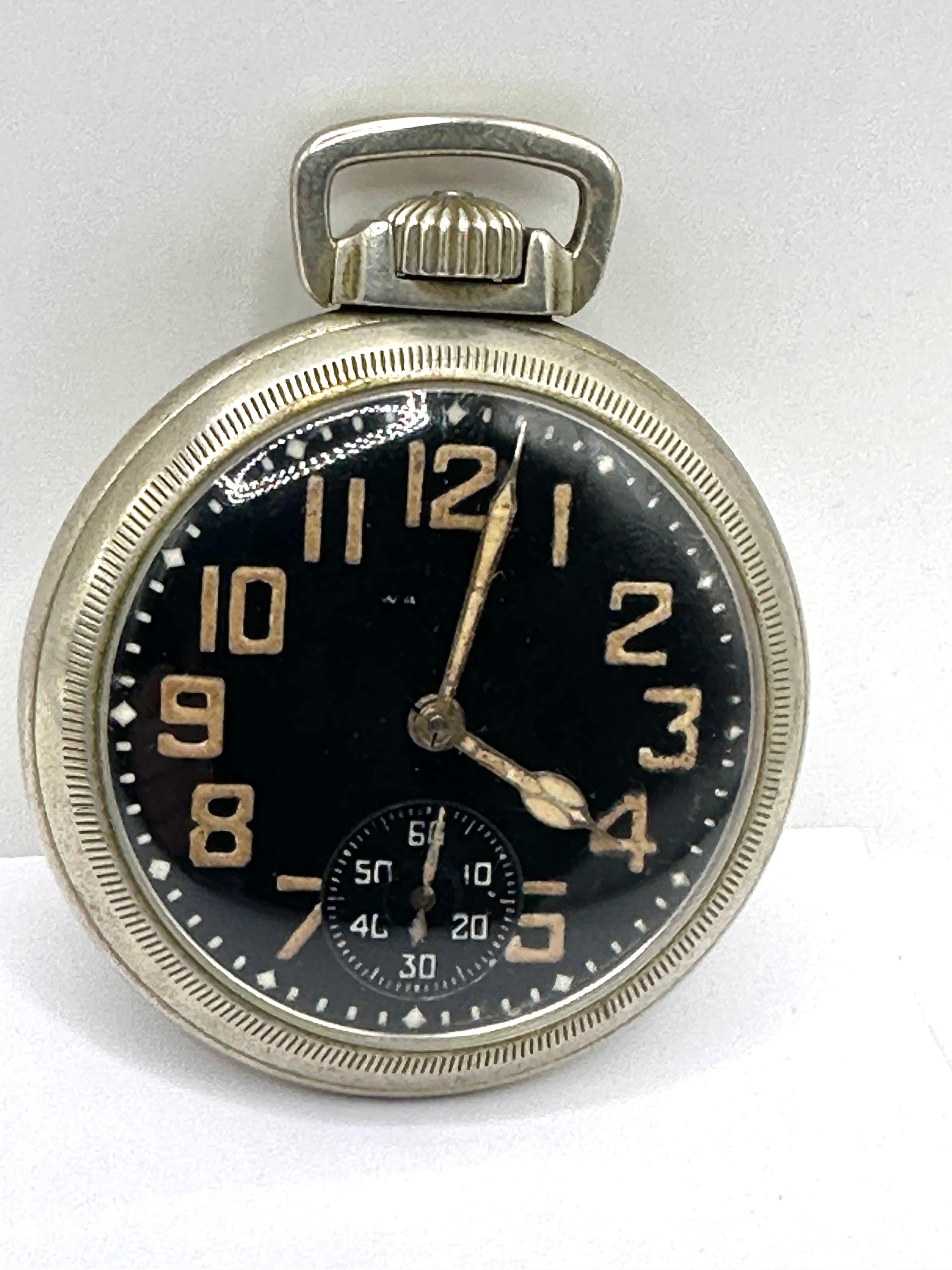 A WW1 Military Open Face Pocket Watch with Broad Arrow Mark
