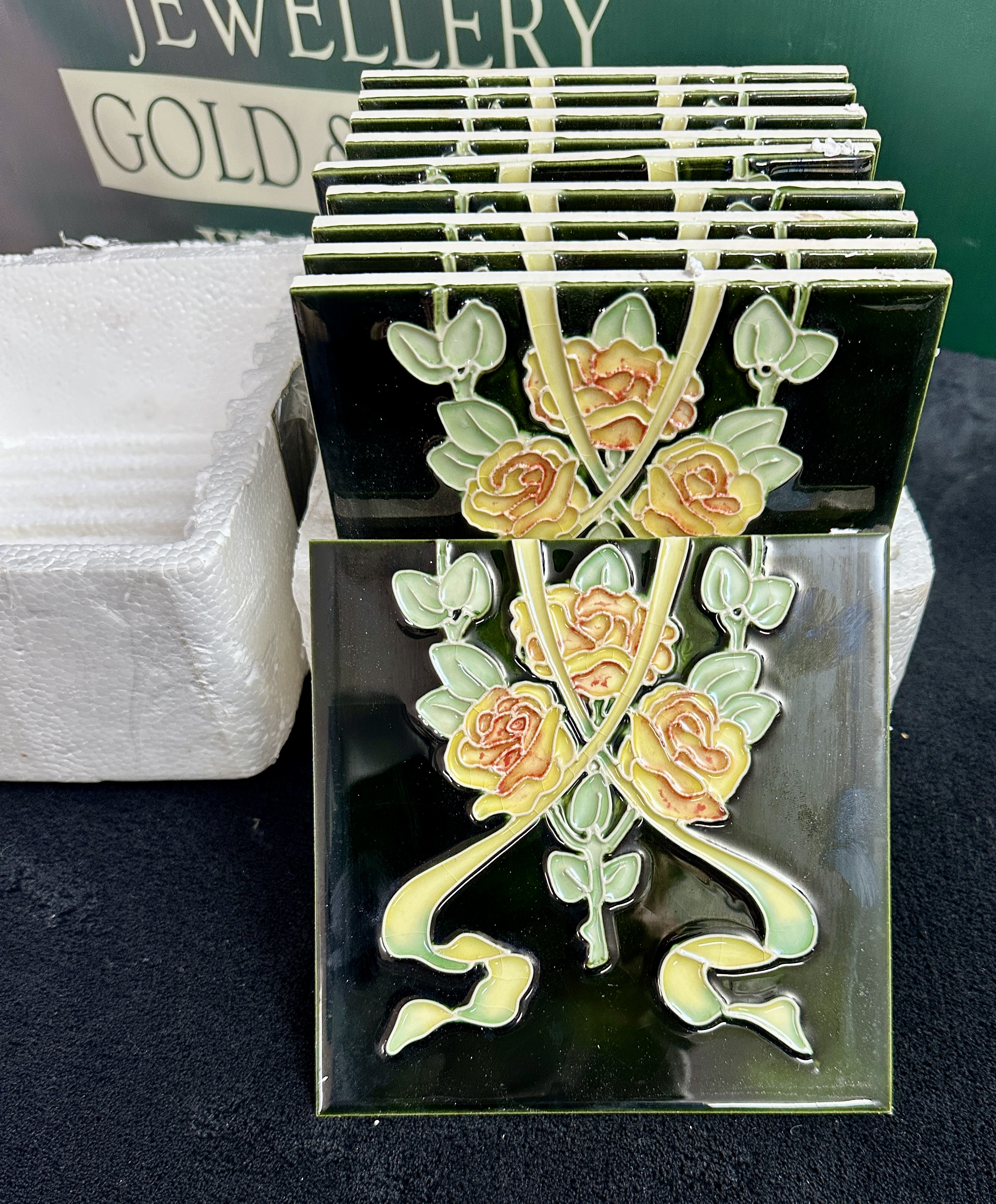 A Set of Nine Art Nouveau Glazed Earthenware Tiles