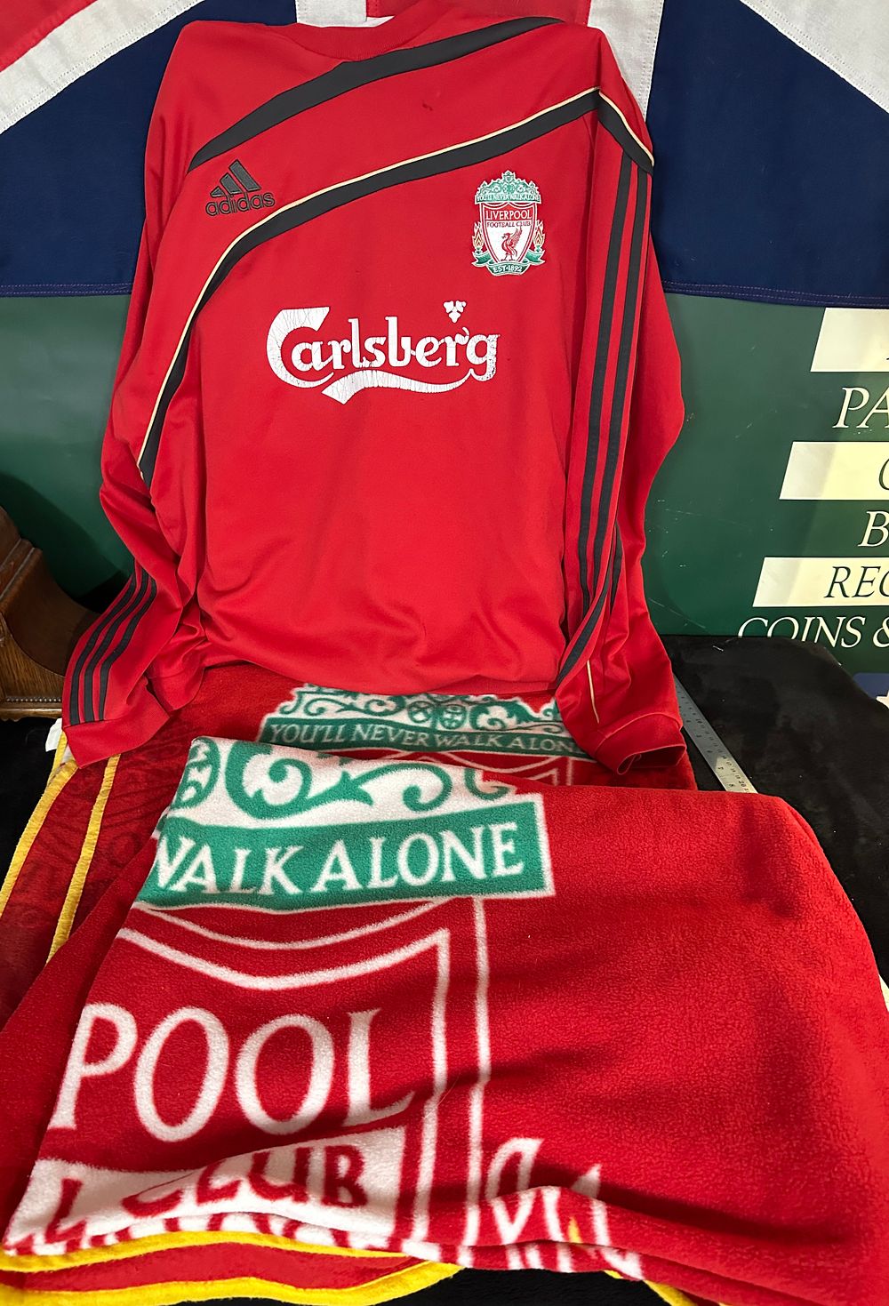 Lot 406: An Adidas Liverpool Football Club Training Top and Fleece Blanket