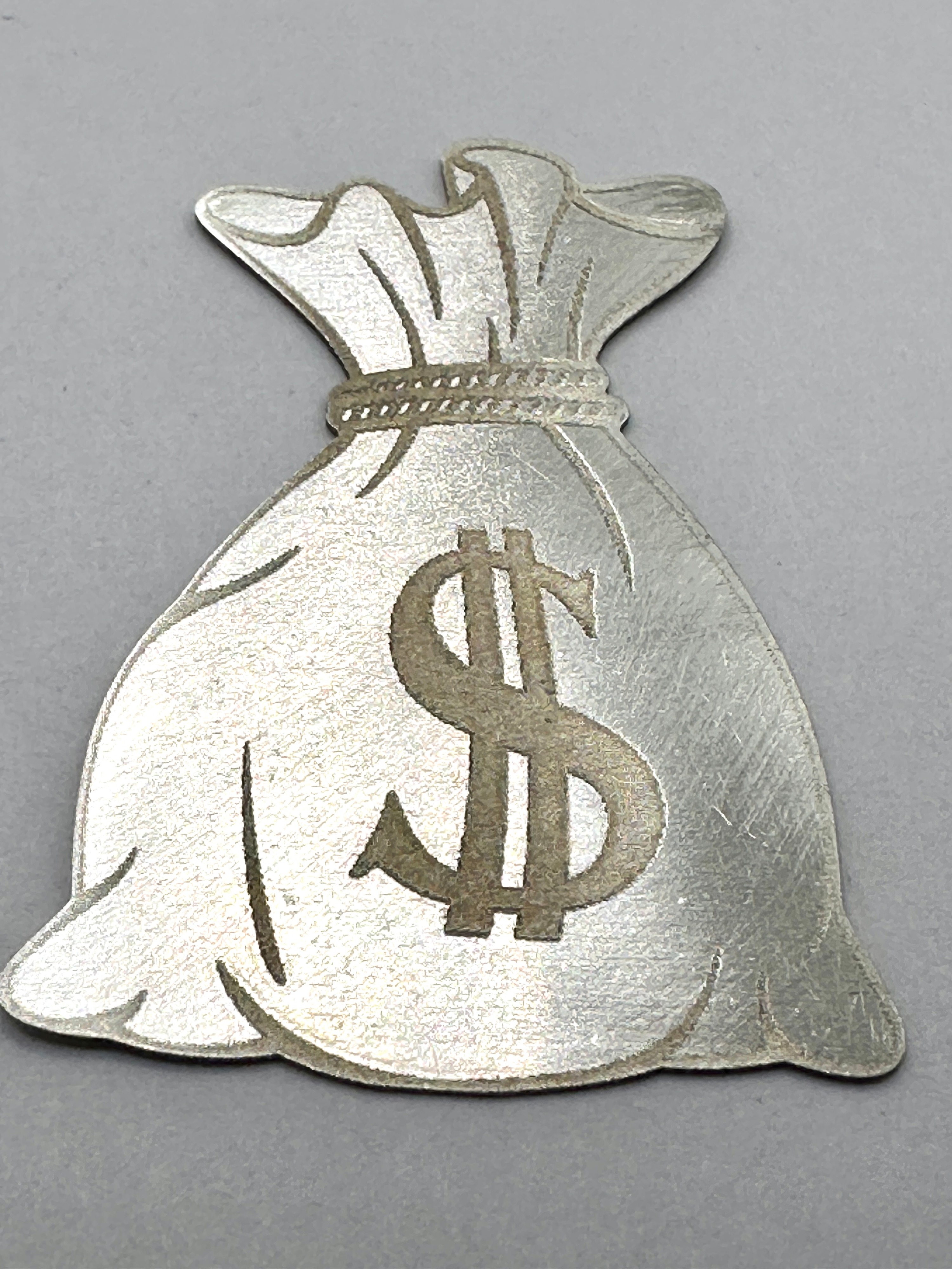 A Die-Cut Fine Silver Money Bag Novelty Bullion Piece