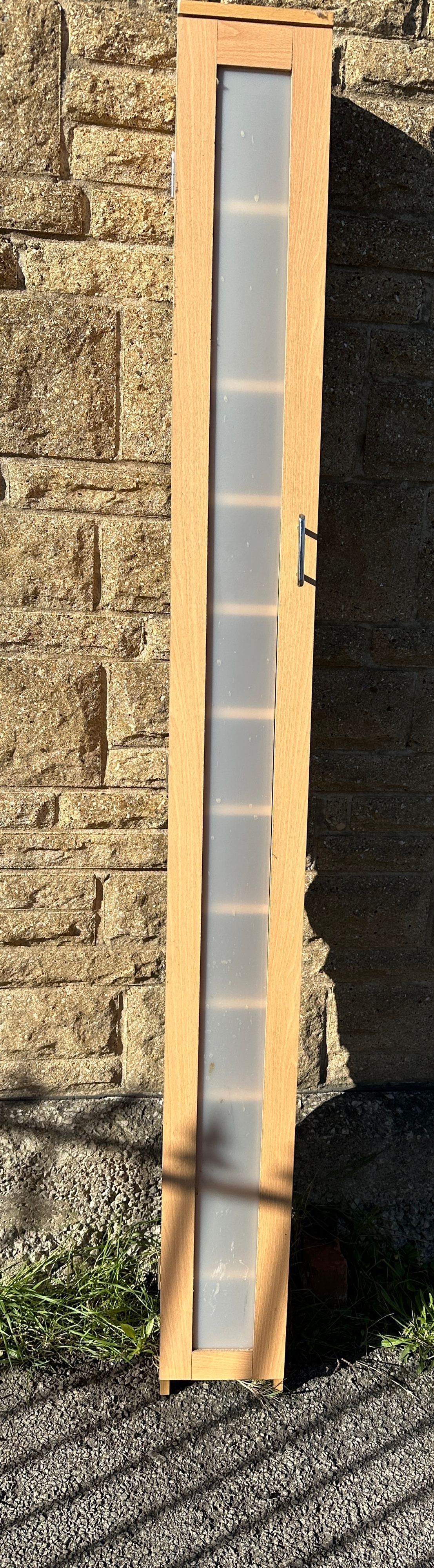 A Contemporary Slimline Storage Cabinet with Frosted Glazing