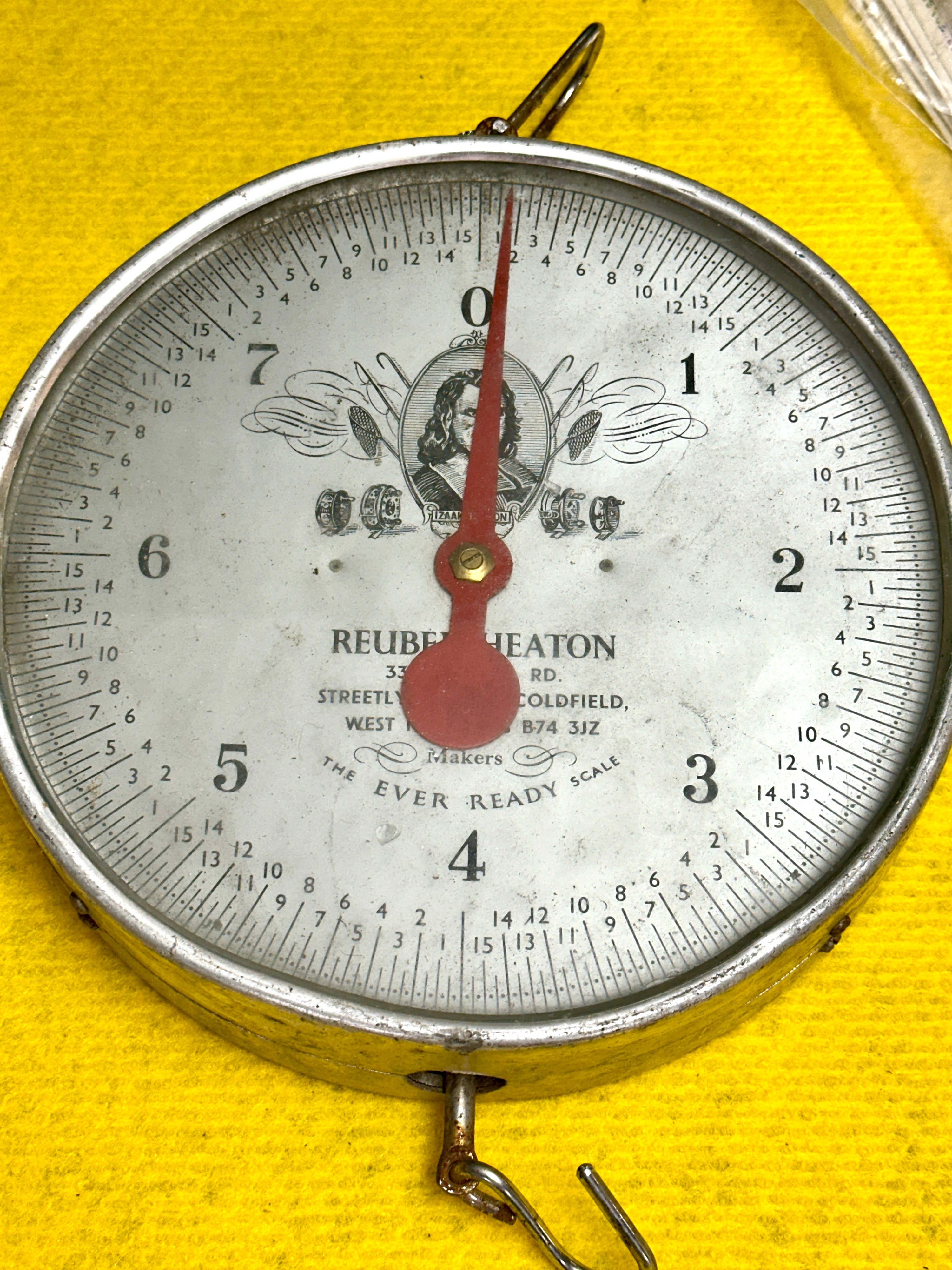 A Reuben Heaton Izaak Walton Circular Hanging Spring Scale