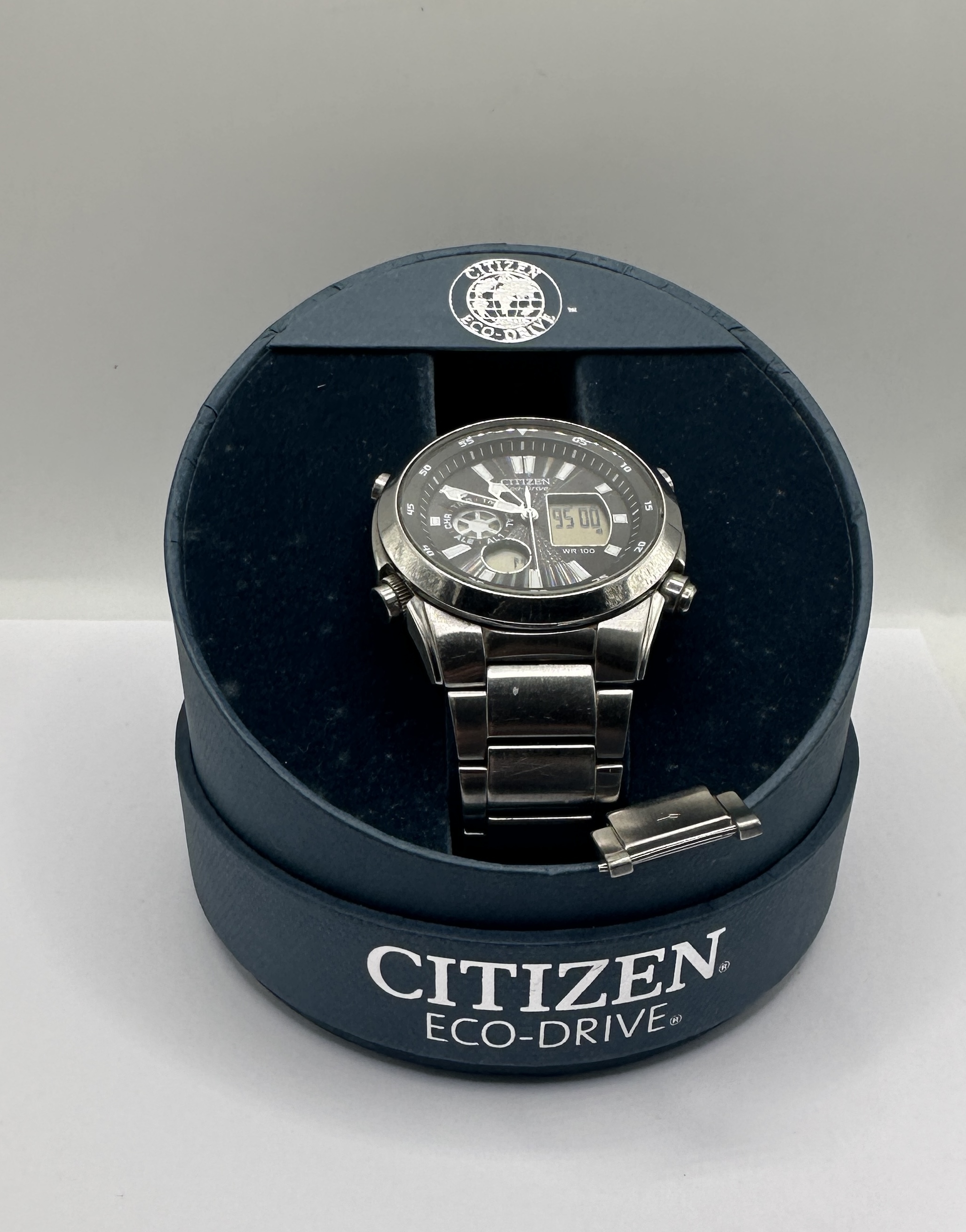 A Citizen Eco-Drive World Time Stainless Steel Wristwatch with Original Packaging