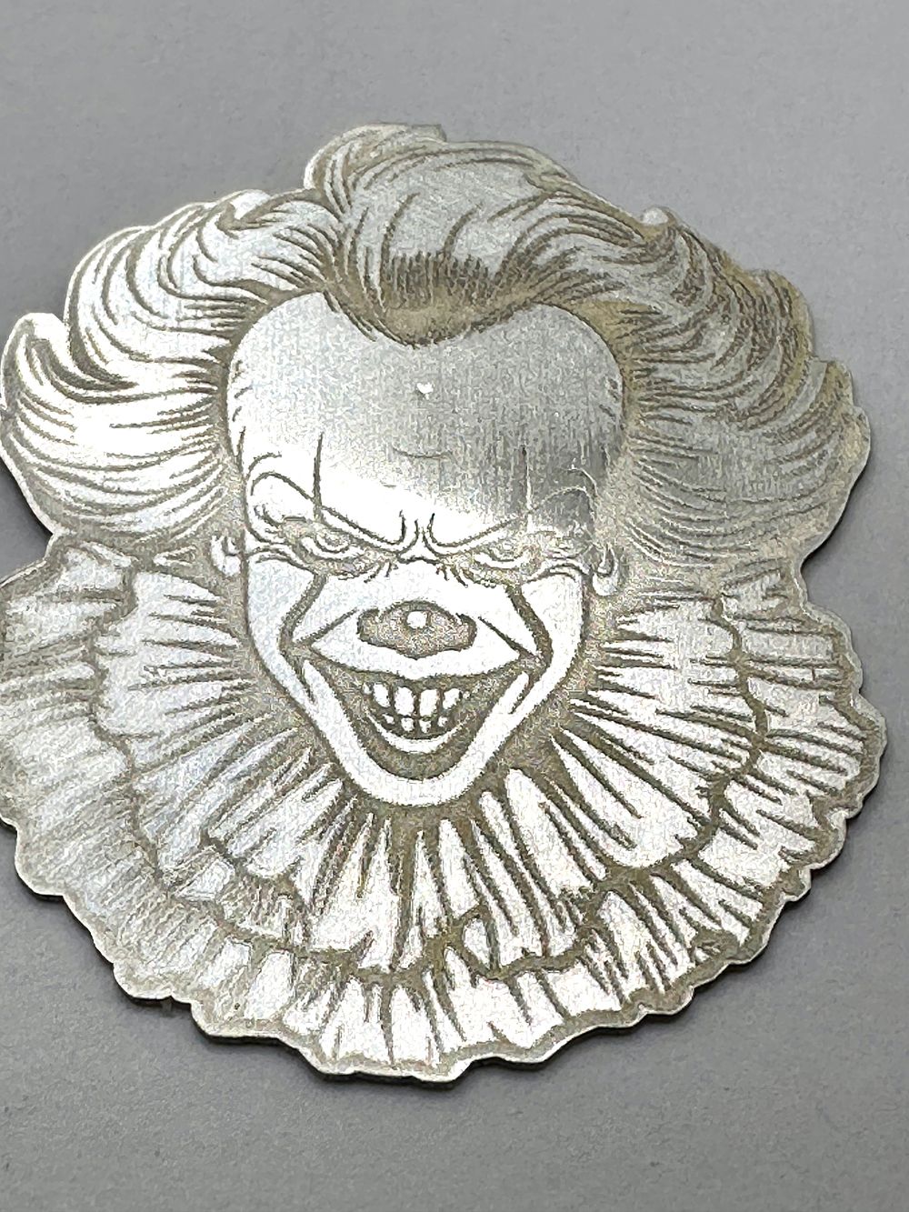 Lot 437: A 999 Fine Silver Pennywise Novelty Bullion Piece