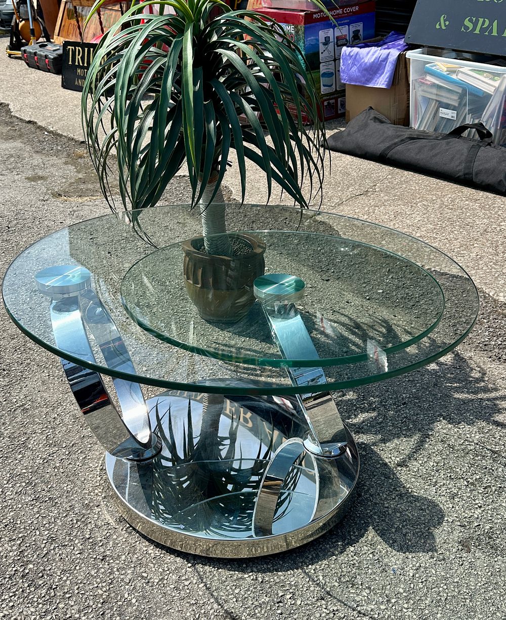 Lot 524: A Contemporary Metal and Glass Orbital Swivel Coffee Table