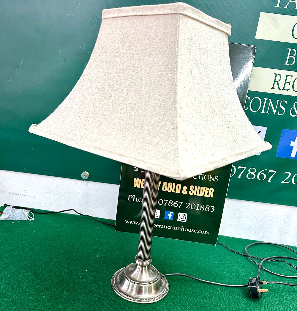 Lot 540: A Table Lamp with Fluted Column and Fabric Shade