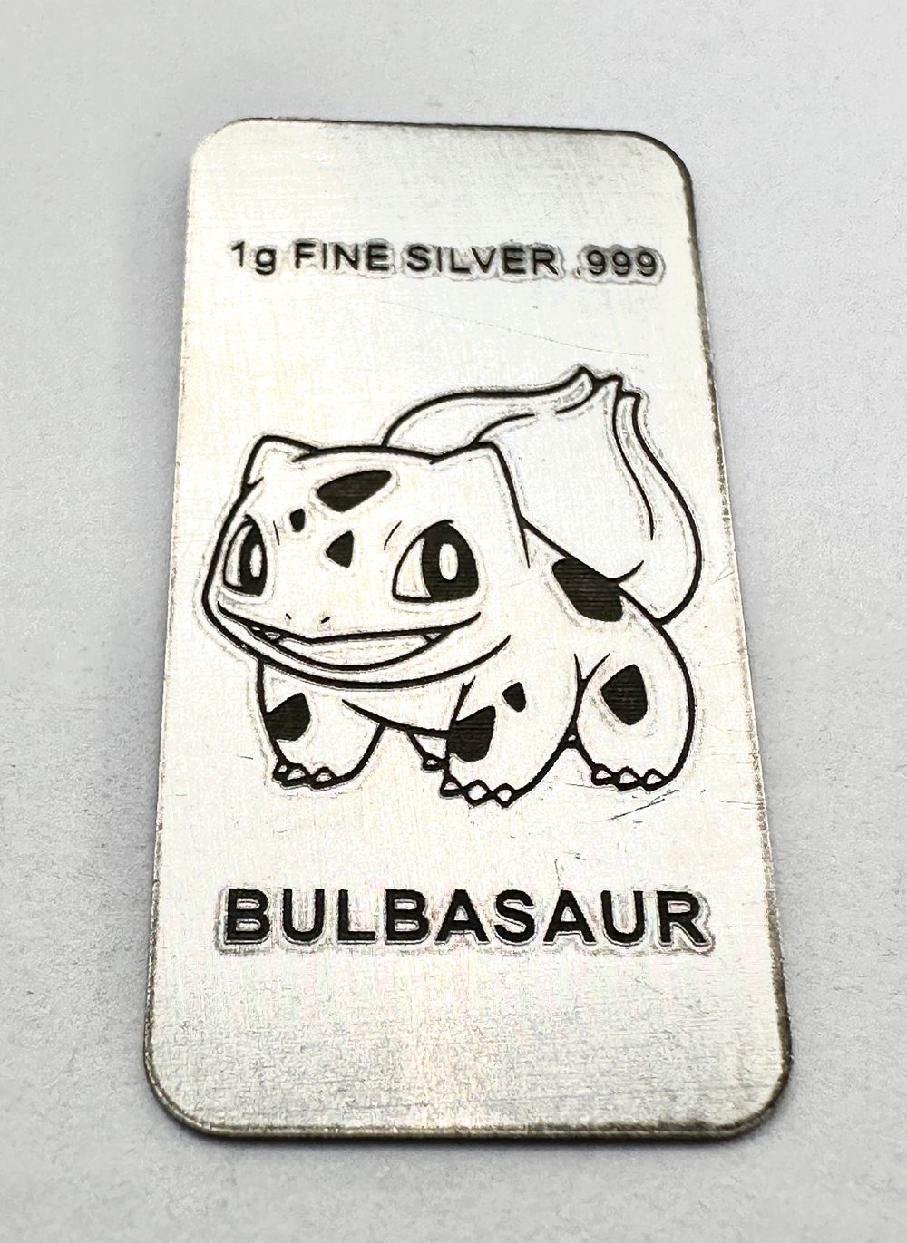 Lot 460: A .999 Fine Silver 1g Bullion Bar, Bulbasaur