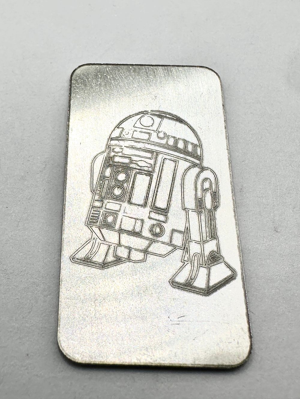 Lot 463: A .999 Fine Silver R2-D2 Rectangular Bullion Bar