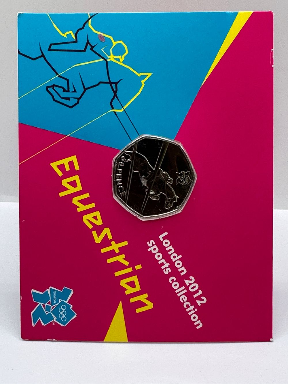 Lot 556: UK 2011 London 2012 Equestrian 50 Pence Coin