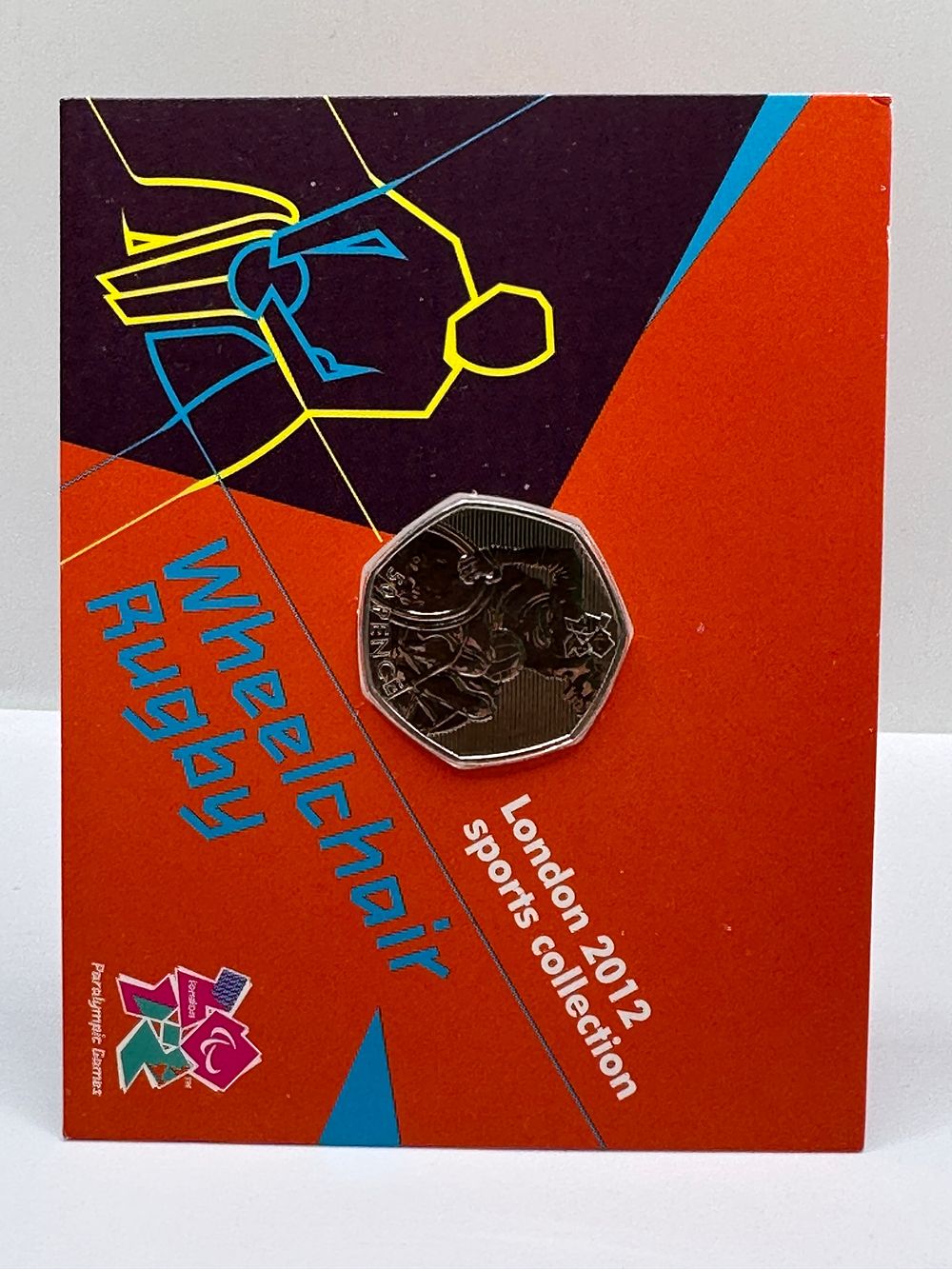 Lot 558: UK 2011 London 2012 Sports Collection Wheelchair Rugby 50 Pence Coin