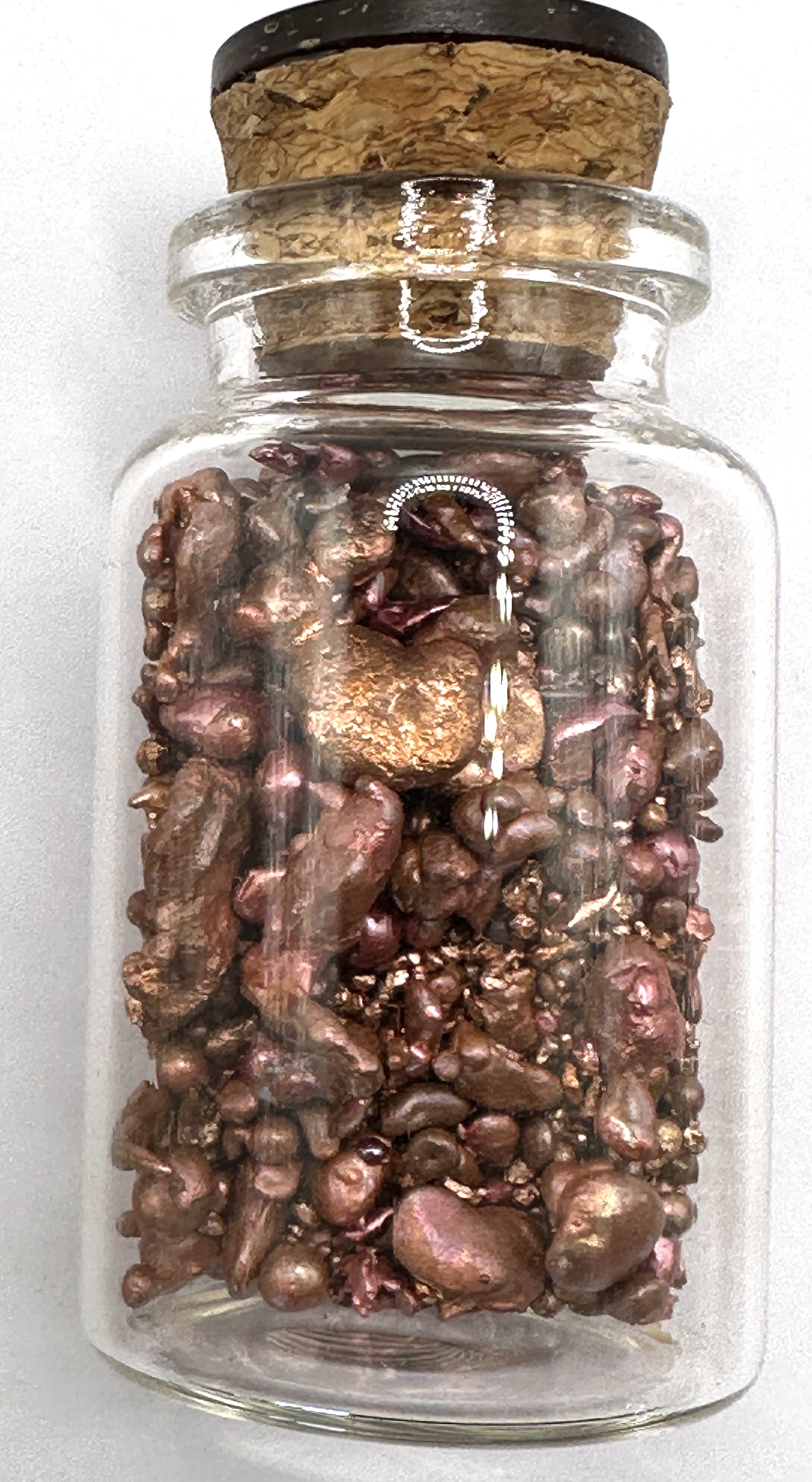 Two Ounces of Copper Casting Grain in a Glass Vial