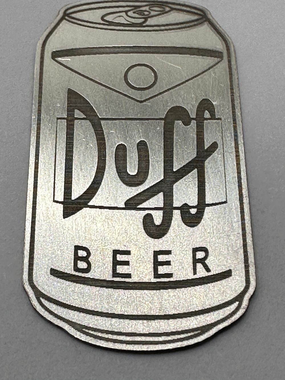 Lot 151: A Duff Beer Design 999 Fine Silver Bullion Bar