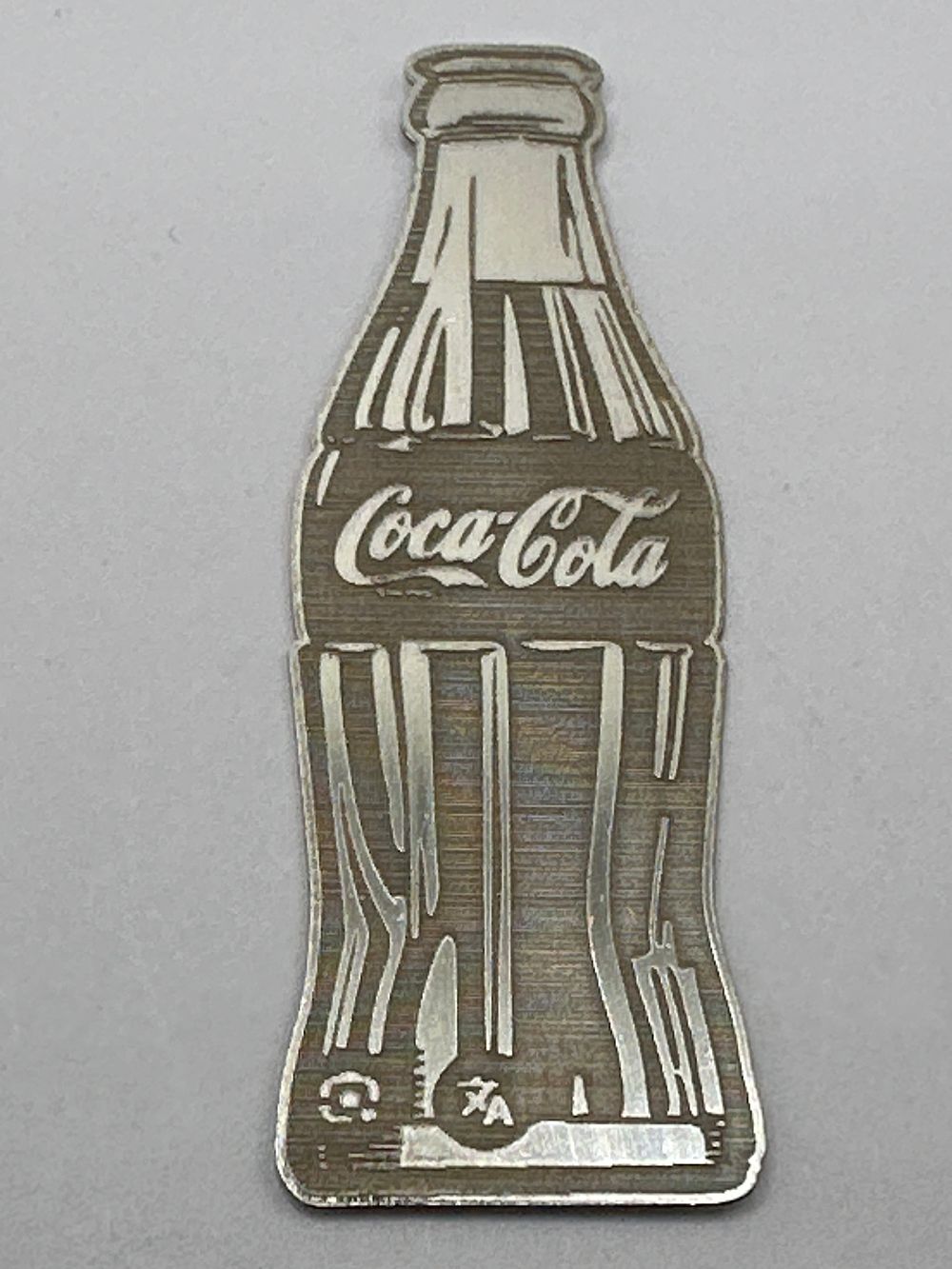 Lot 152: A Coca-Cola Bottle Shaped 1 Gram 999 Fine Silver Bar