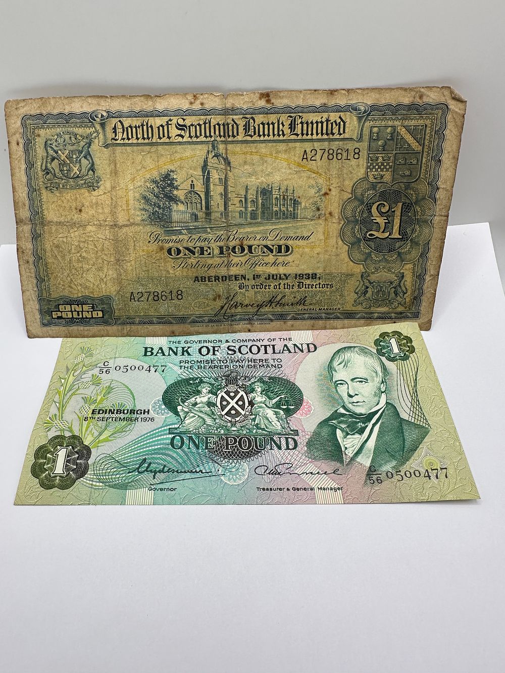 Lot 172: A Pair of Scottish One Pound Banknotes, 1938 and 1976