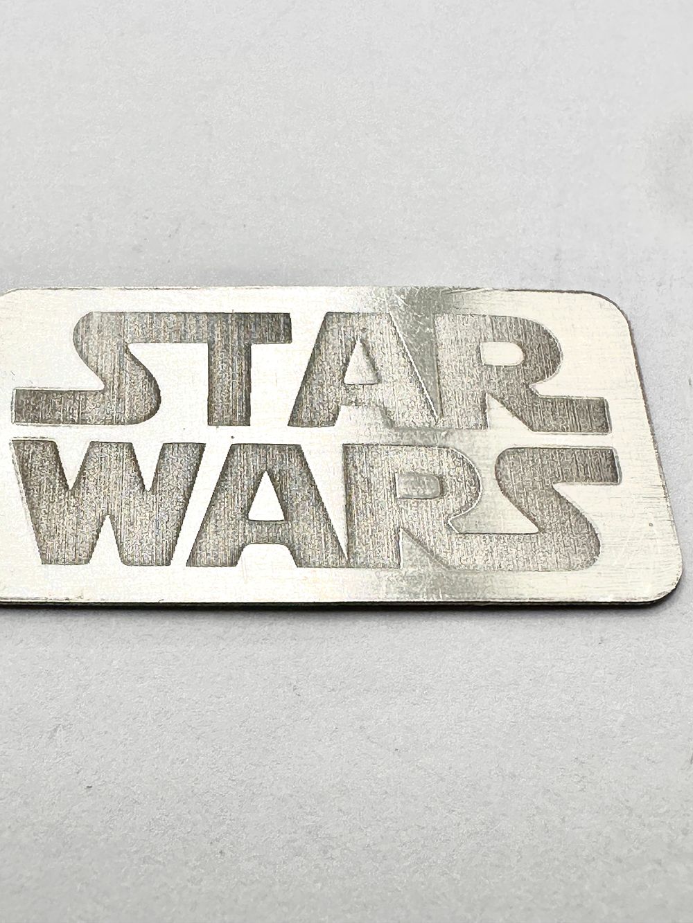 Lot 178: A Star Wars 999 Fine Silver Logo Ingot