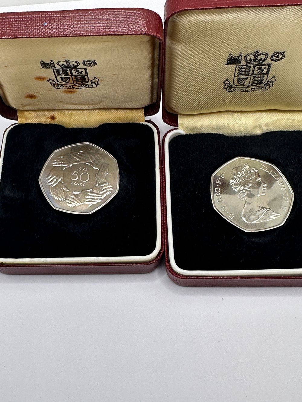 Lot 202: UK 1973 Elizabeth II 50 Pence Commemorative Coin Pair, boxed