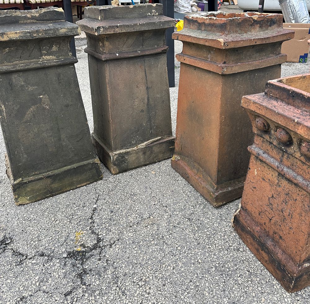 Lot 99: A Set of Four Late-19th Century Terracotta Chimney Pots
