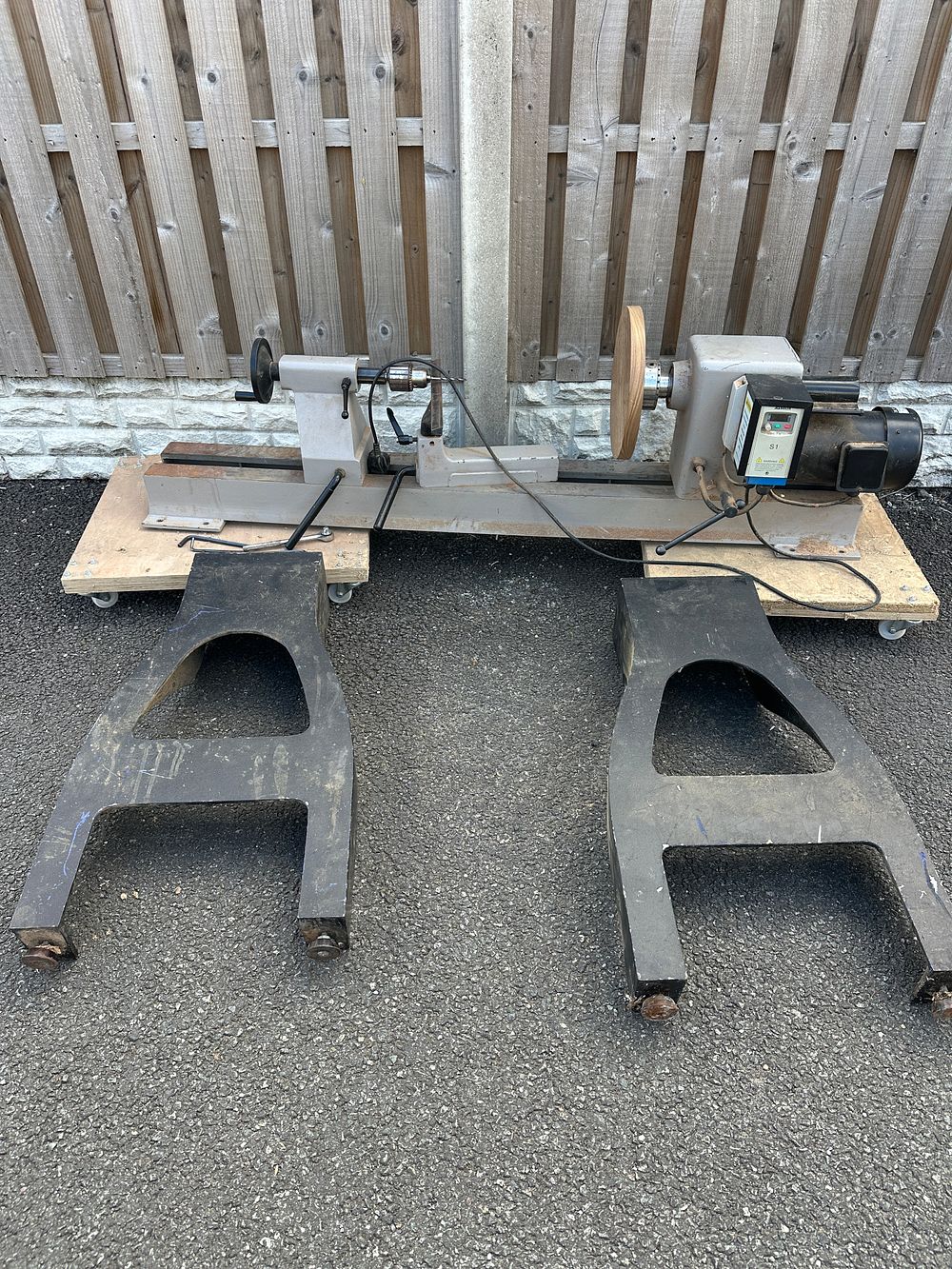 Lot 108: A Variable Speed Woodturning Lathe with Cast Iron Stands
