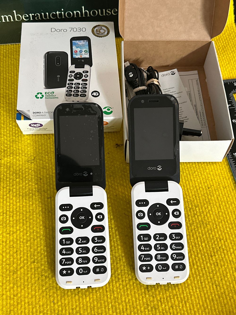 Lot 194: A Doro 7030 4G Mobile Phone with Accessories and Box