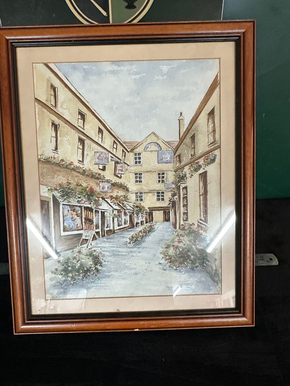 Lot 157: A Framed Watercolor Street Scene