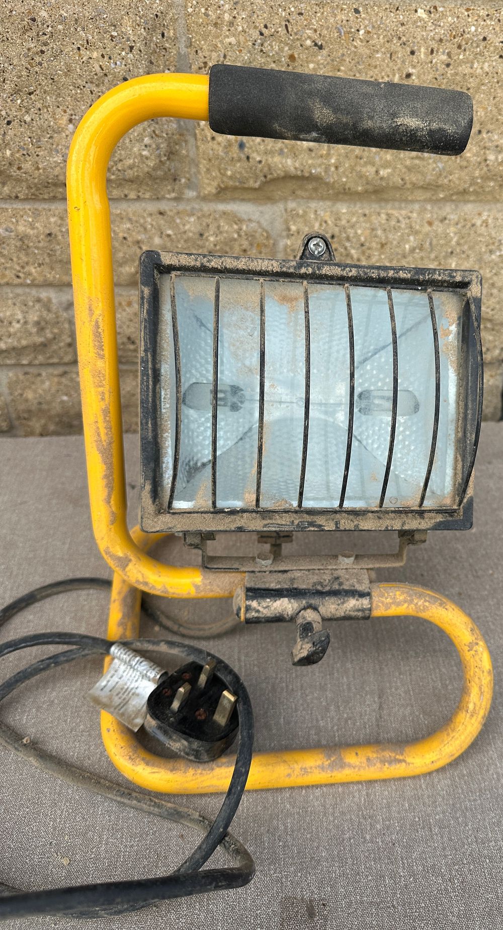 Lot 139: A Portable Halogen Work Light with Tubular Frame and UK Plug