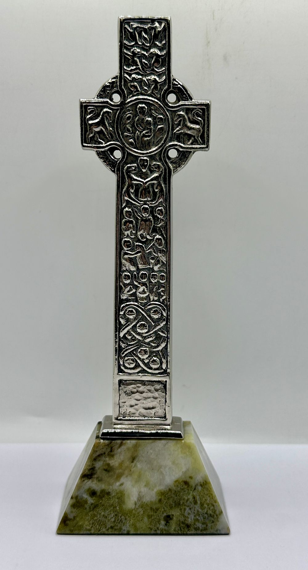 Lot 185: A White Metal Celtic High Cross on a Connemara Marble Base