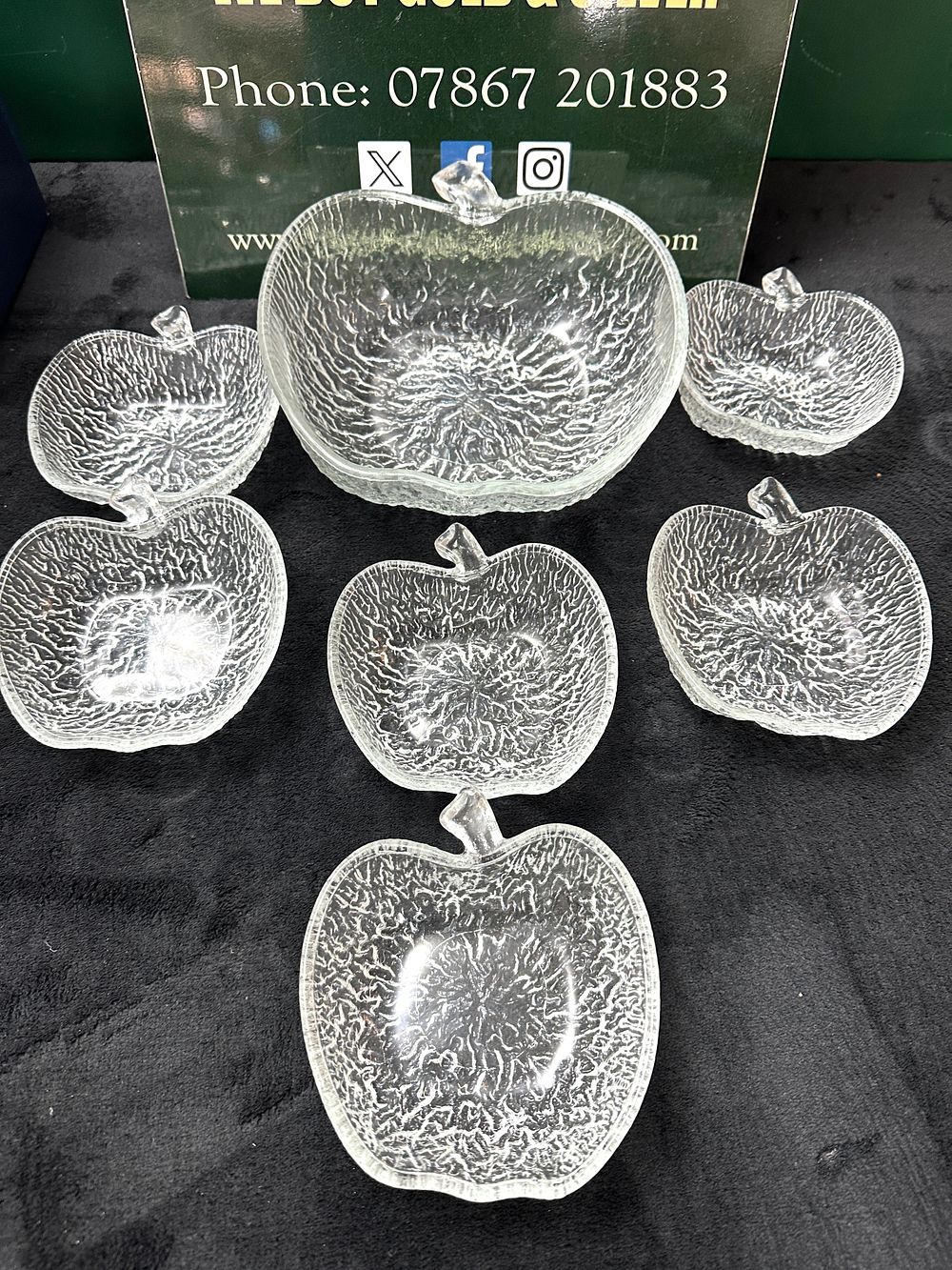 Lot 71: A Seven-Piece Textured Glass Apple-Shaped Dessert Set