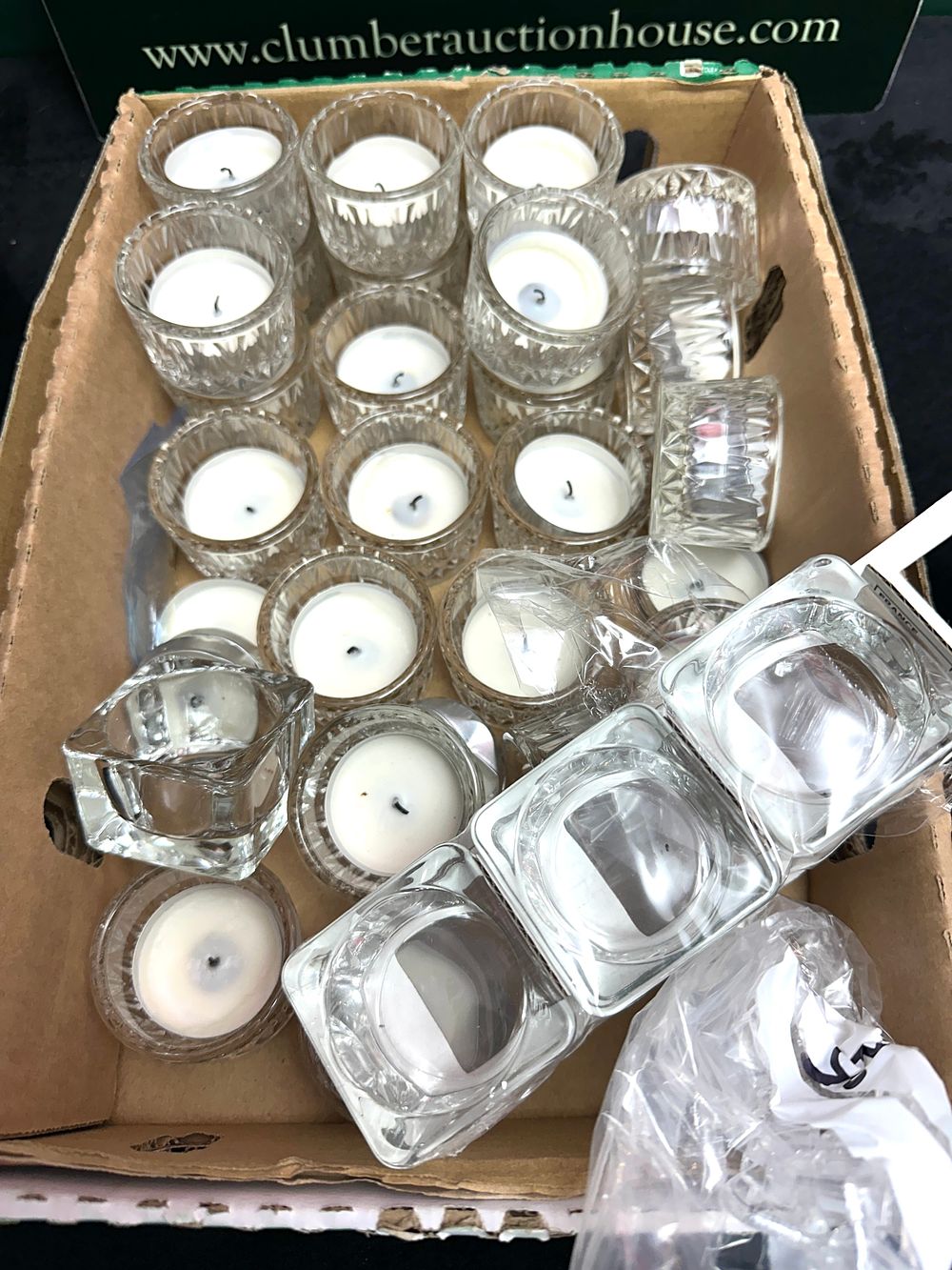 Lot 287: A Collection of Cut Glass and Square Heavy Cast Glass Candle Holders