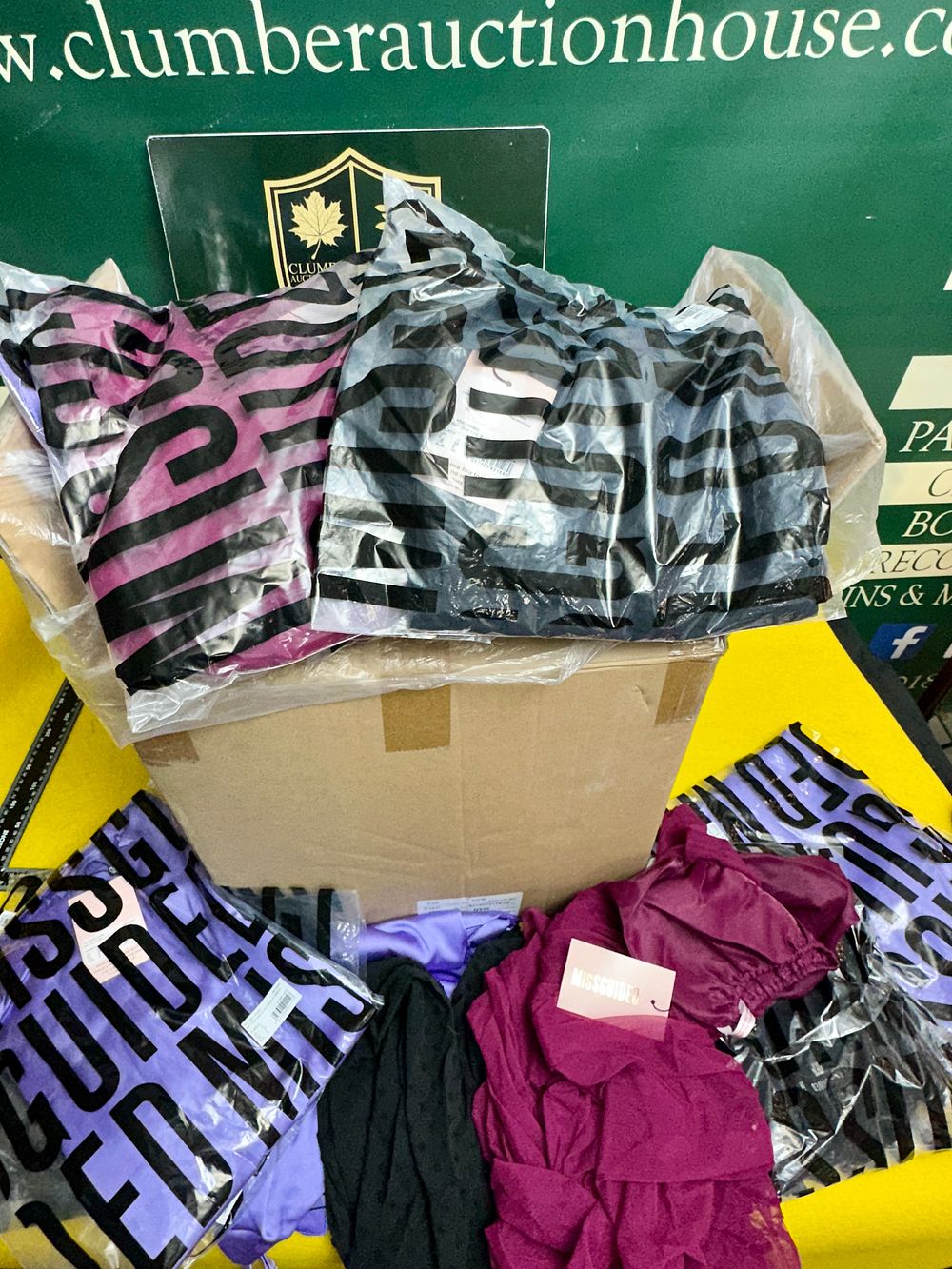 Lot 298: A Collection of Missguided Branded Women's Dresses and Tops