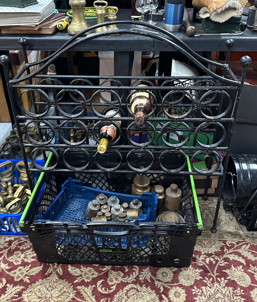 Lot 316: A Metal Arched Wine Rack