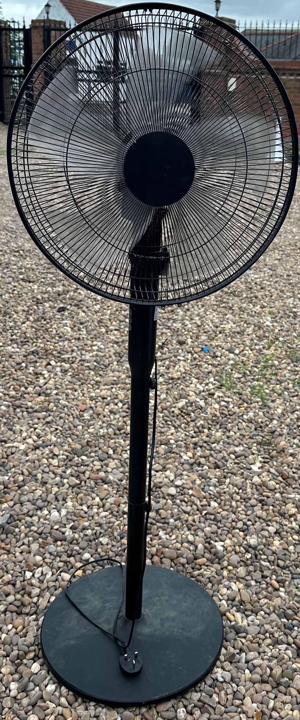 Lot 321: A Modern Pedestal Fan with Adjustable Height and Weighted Base