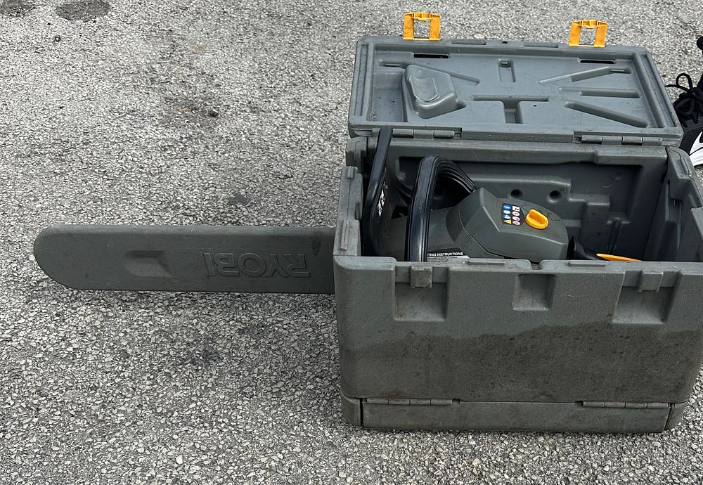 Lot 89: A  Ryobi RCS-4040C Petrol Chainsaw with Original Carrying Case
