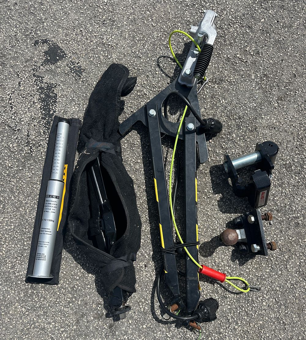 Lot 331: A Milenco Noseweight Gauge, AL-KO Hitch Lock, and Towing Accessories