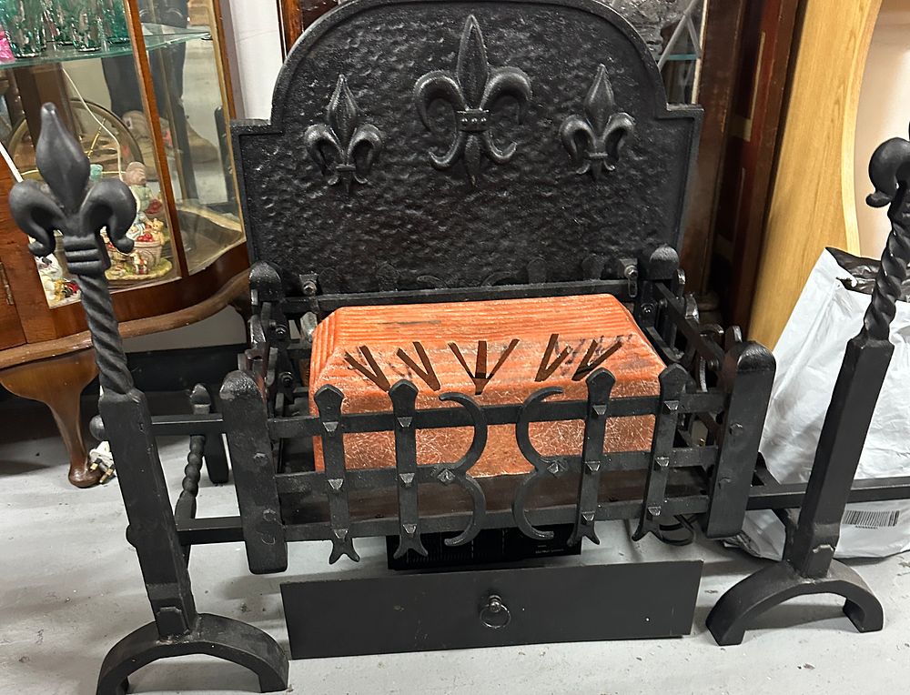 Lot 333: A Gothic Revival Style Metal Electric Fire Grate